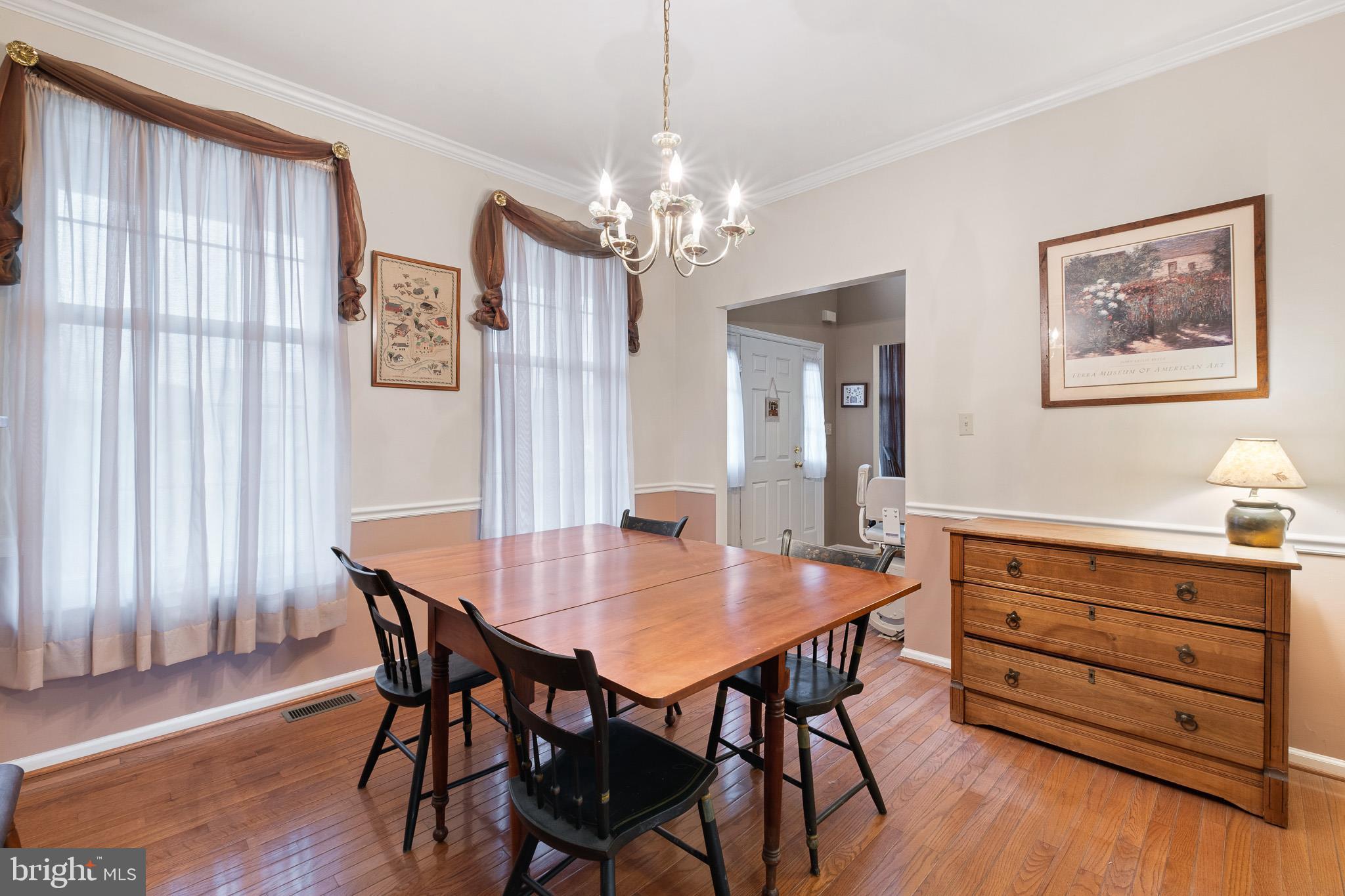 224 West Old Squaw Road Middletown, DE 19709 - Photo 26 of 43 a view of a dining room with furniture and chandelier
