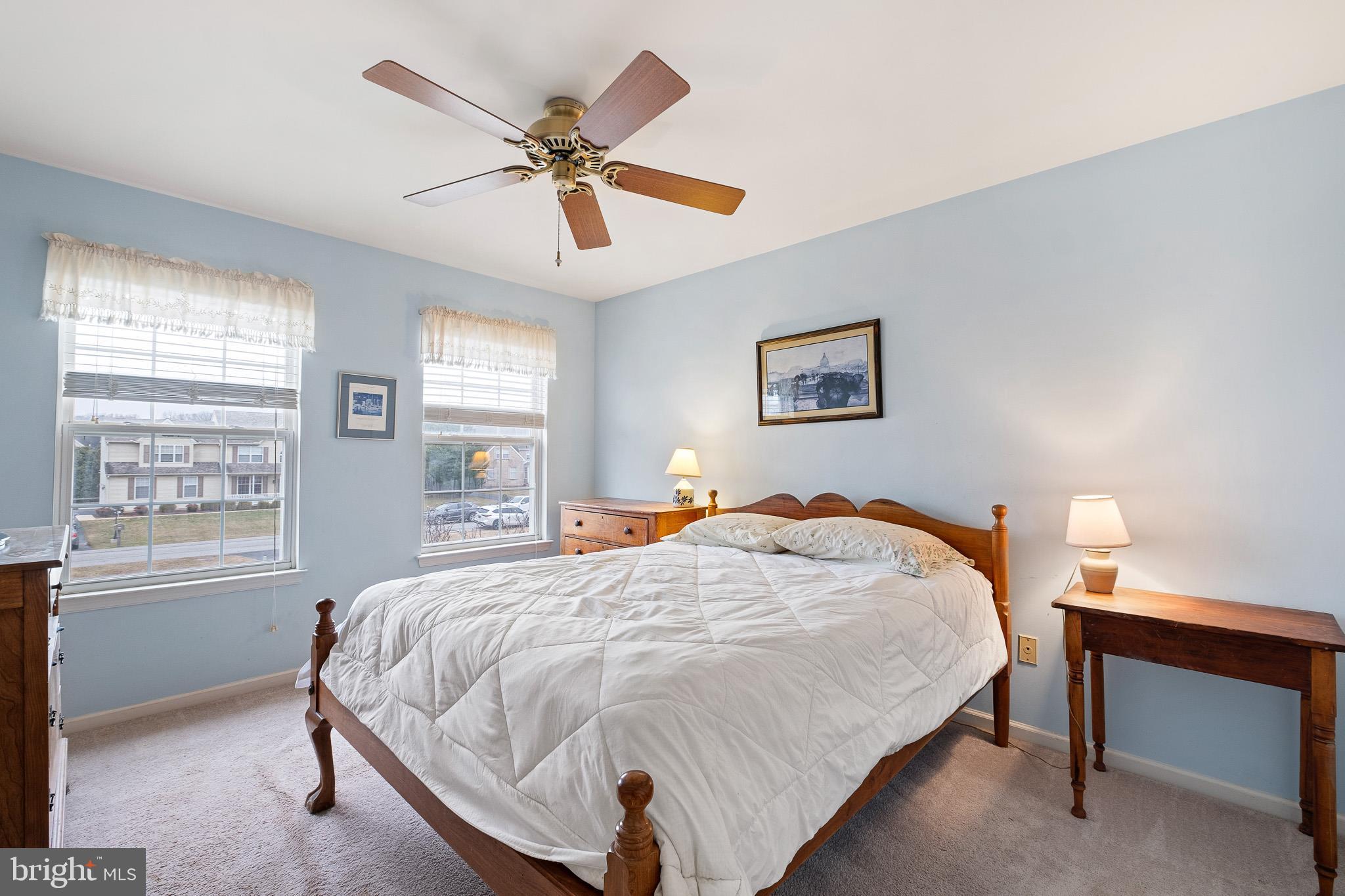 224 West Old Squaw Road Middletown, DE 19709 - Photo 33 of 43 a bedroom with a bed and a chandelier