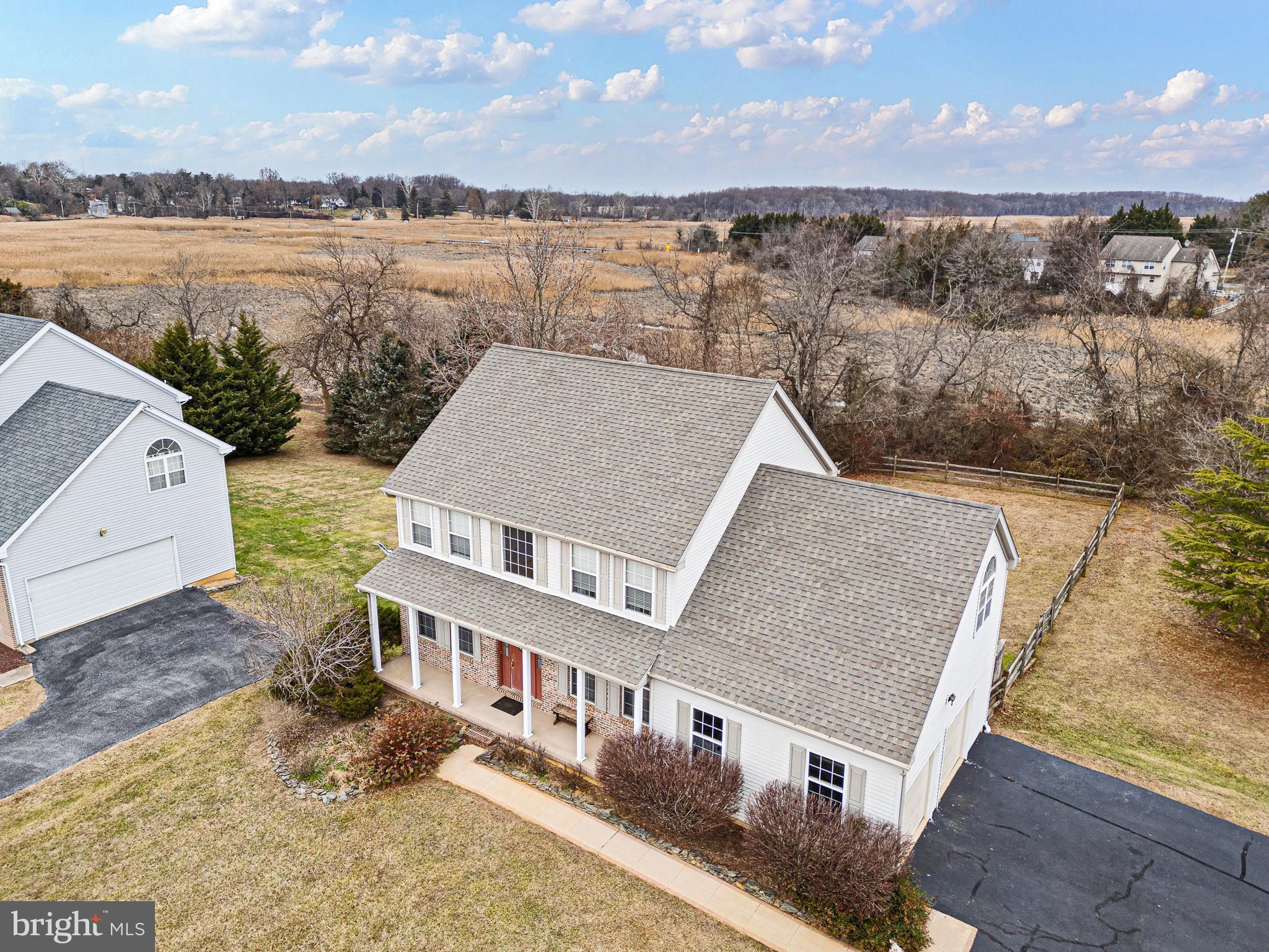 224 West Old Squaw Road Middletown, DE 19709 - Photo 9 of 43 a view of a lake with a building in the background