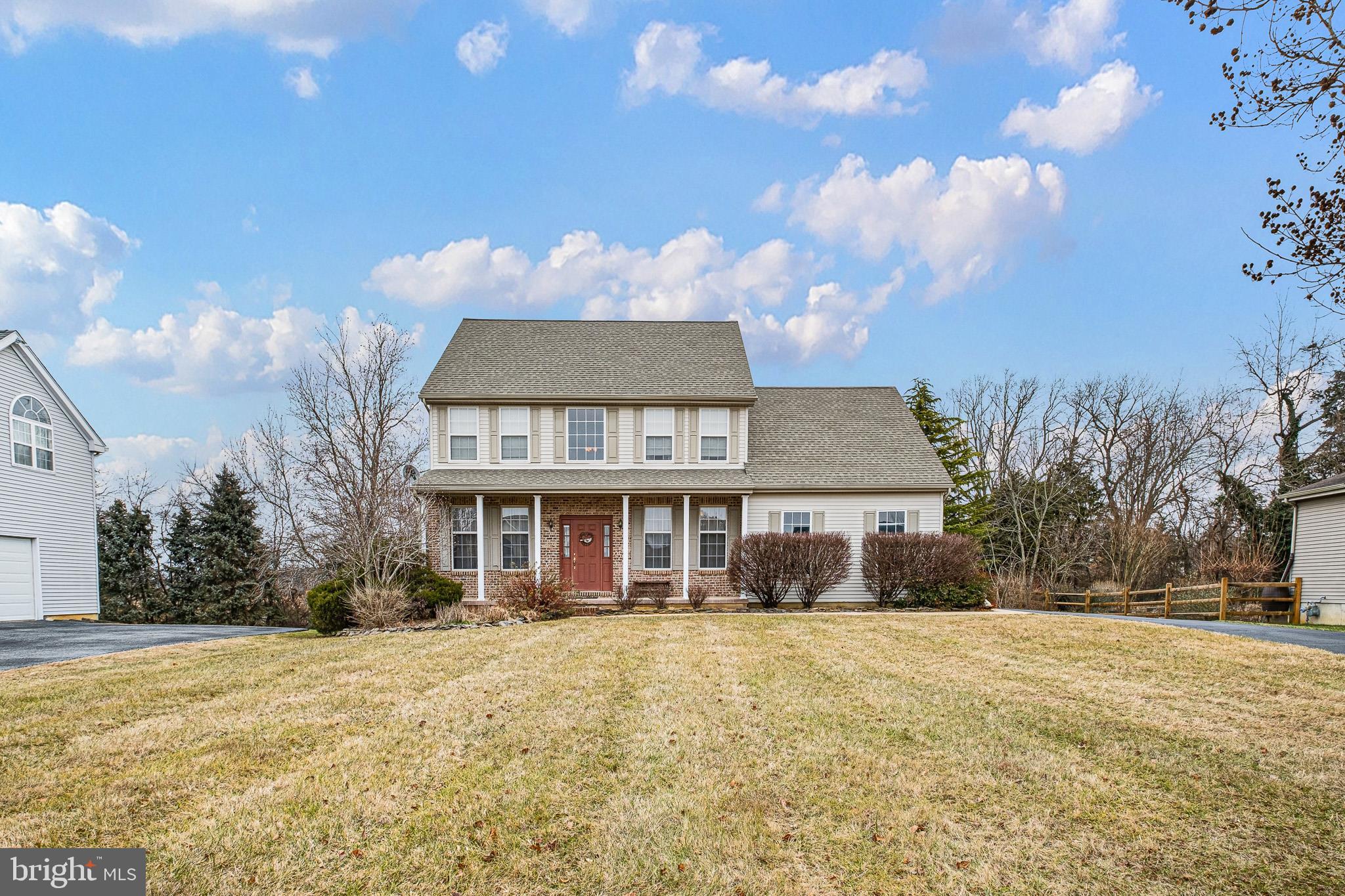 224 West Old Squaw Road Middletown, DE 19709 - Photo 10 of 43 a front view of a house with a yard