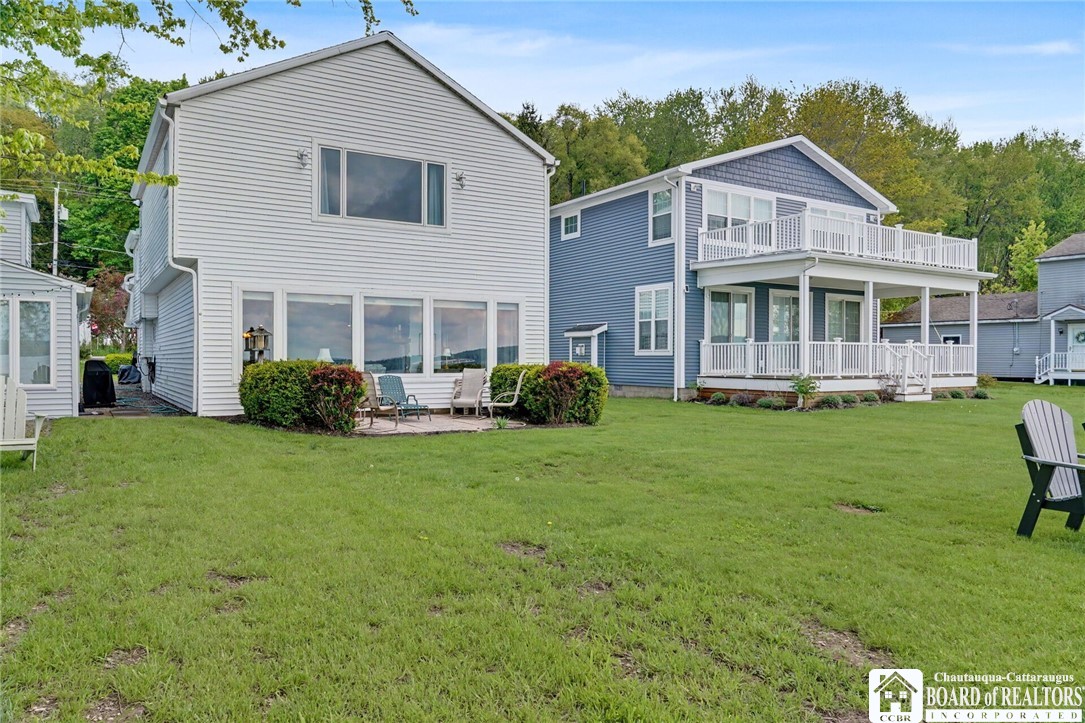 4568 Warners Bay Road Ellery, NY 14712 - Photo 18 of 43 lakeside exterior with spacious lawn , patio seati