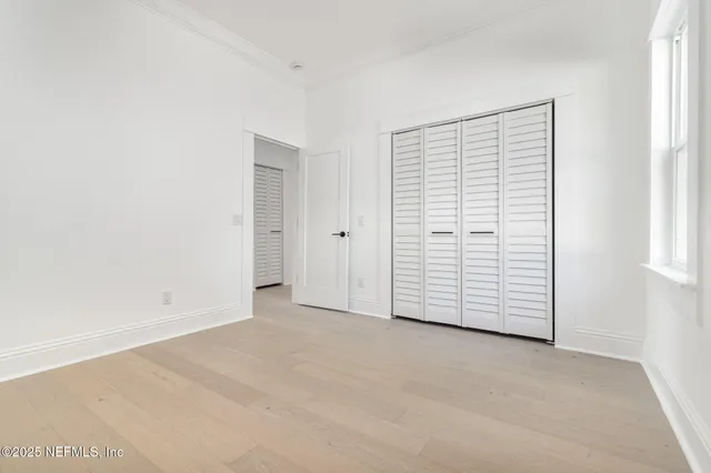 an empty room with closet