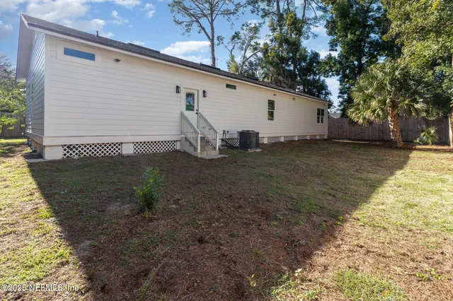 a terrace with outdoor seating and green space
