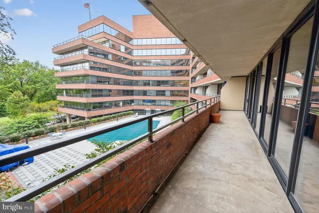 a view of balcony with furniture