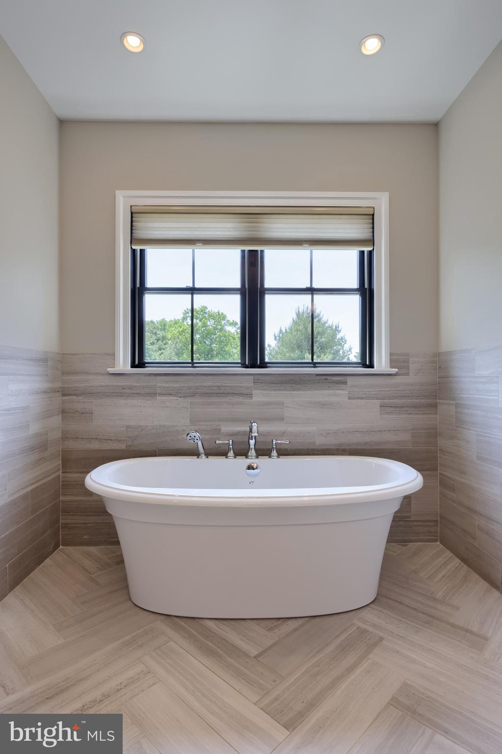 428 Southampton Drive Lititz, PA 17543 - Photo 39 of 60 a white bath tub sitting in a bathroom
