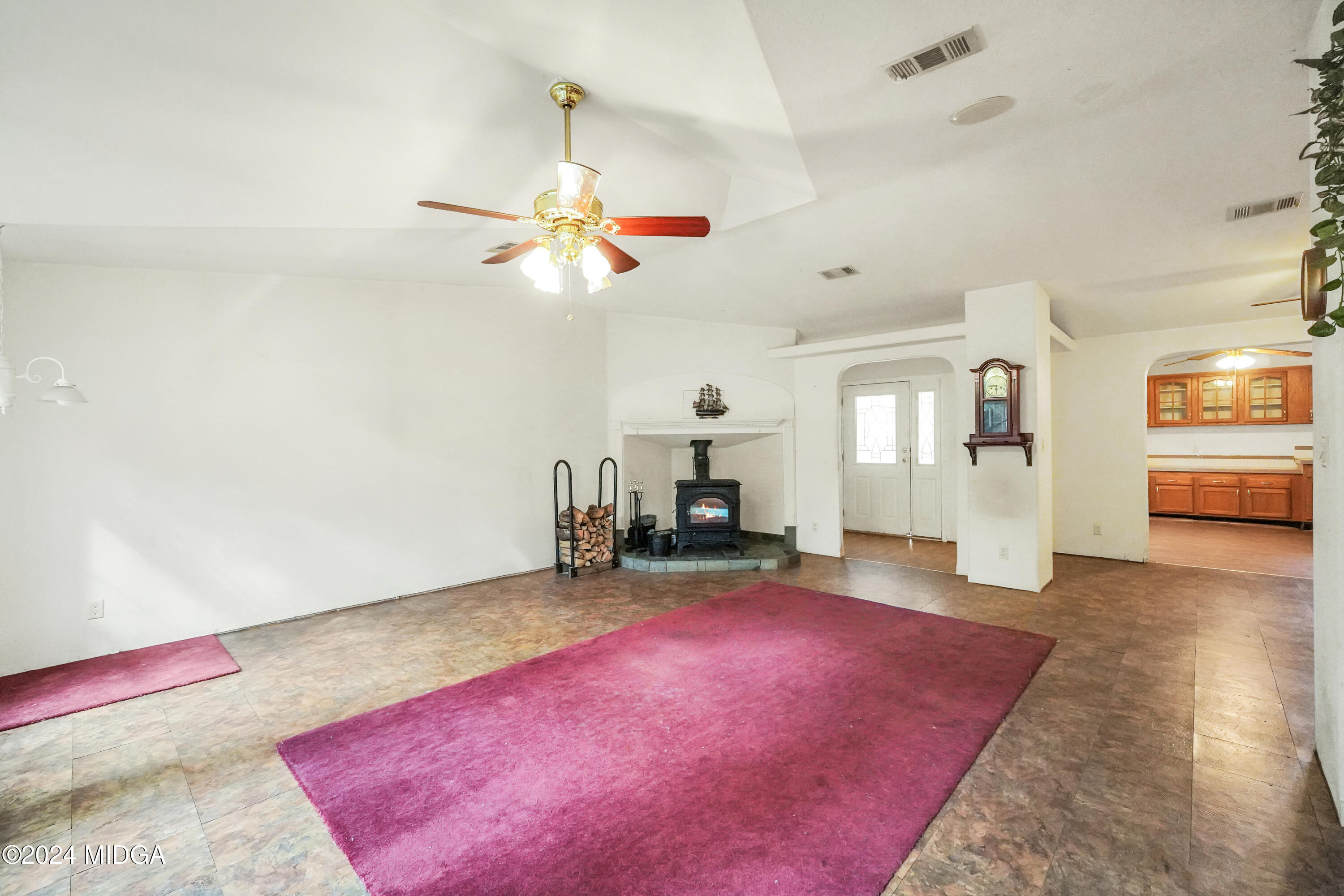 615 Fuller Road Culloden, GA 31016 - Photo 16 of 37 a living room with furniture and a chandelier