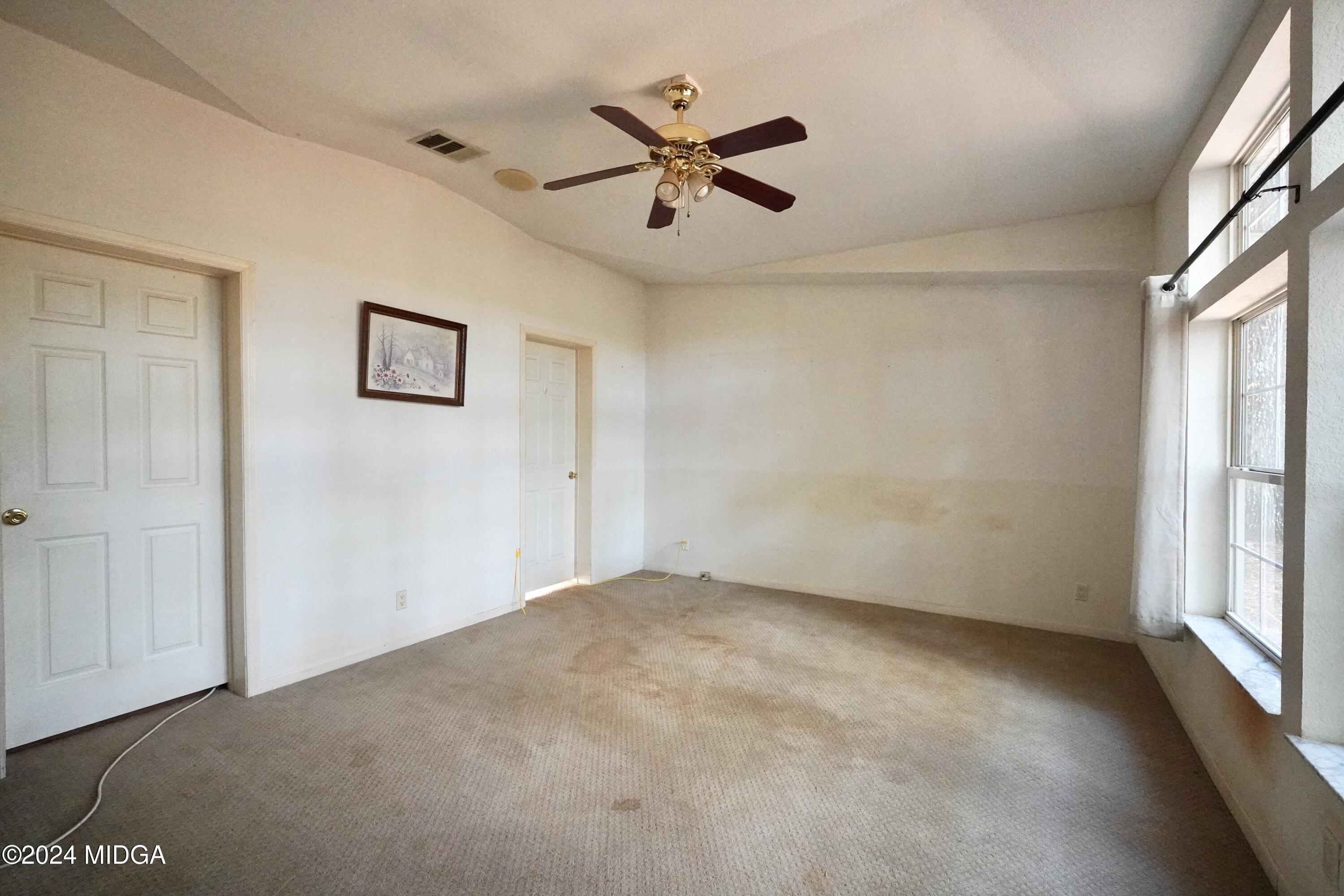 615 Fuller Road Culloden, GA 31016 - Photo 19 of 37 wooden floor in an empty room with a window