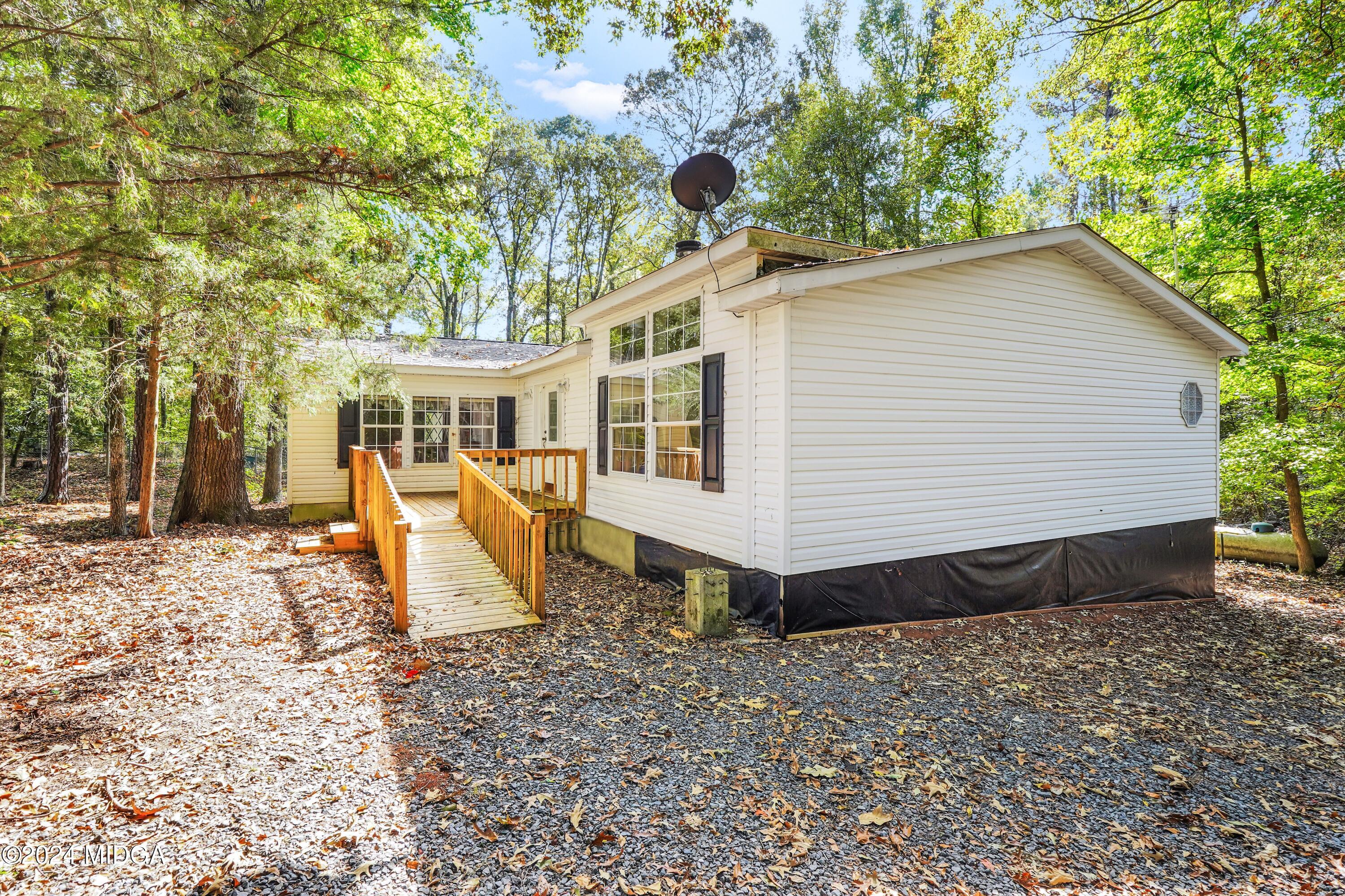 615 Fuller Road Culloden, GA 31016 - Photo 2 of 37 a view of a house with backyard
