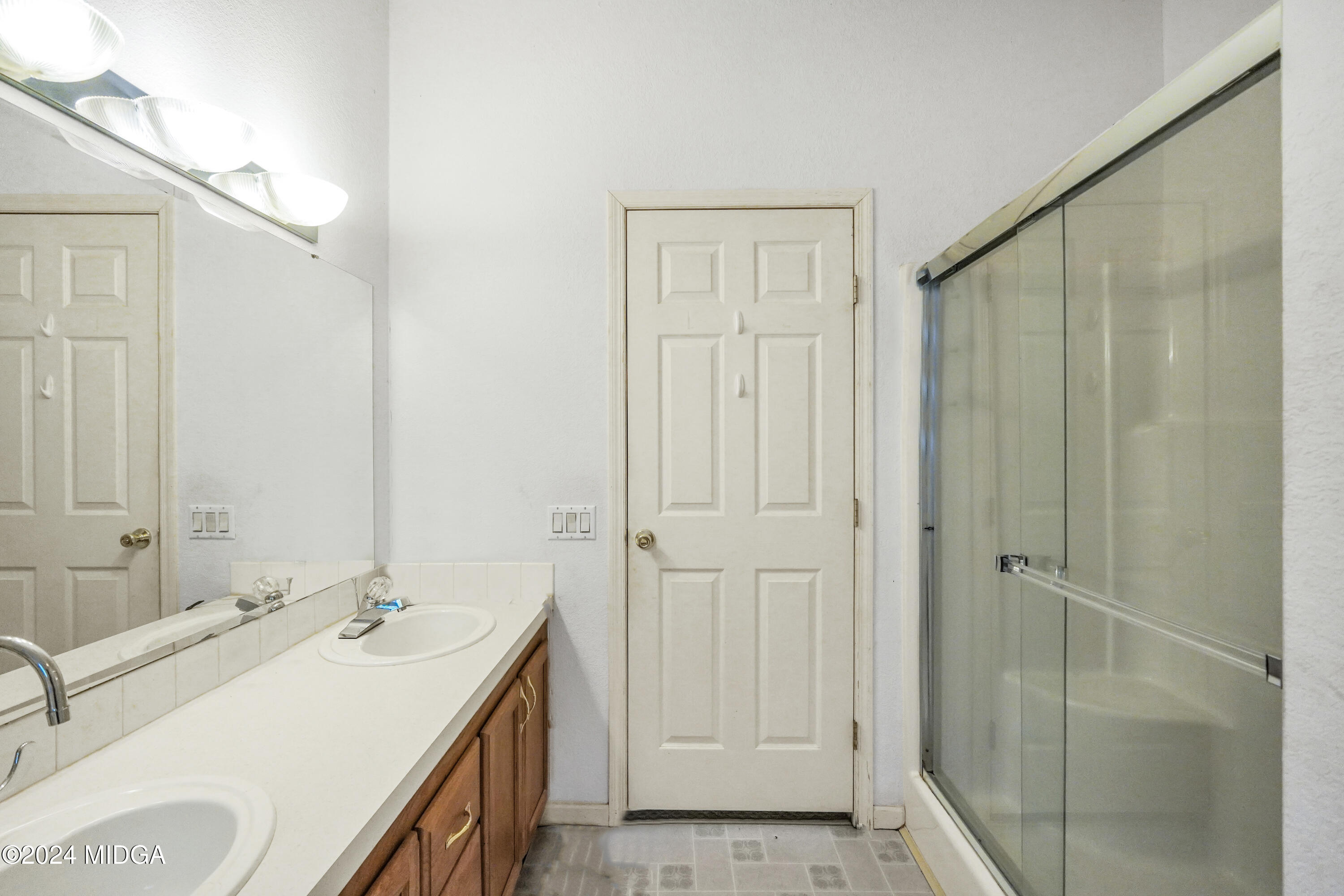 615 Fuller Road Culloden, GA 31016 - Photo 21 of 37 a bathroom with a sink and a mirror