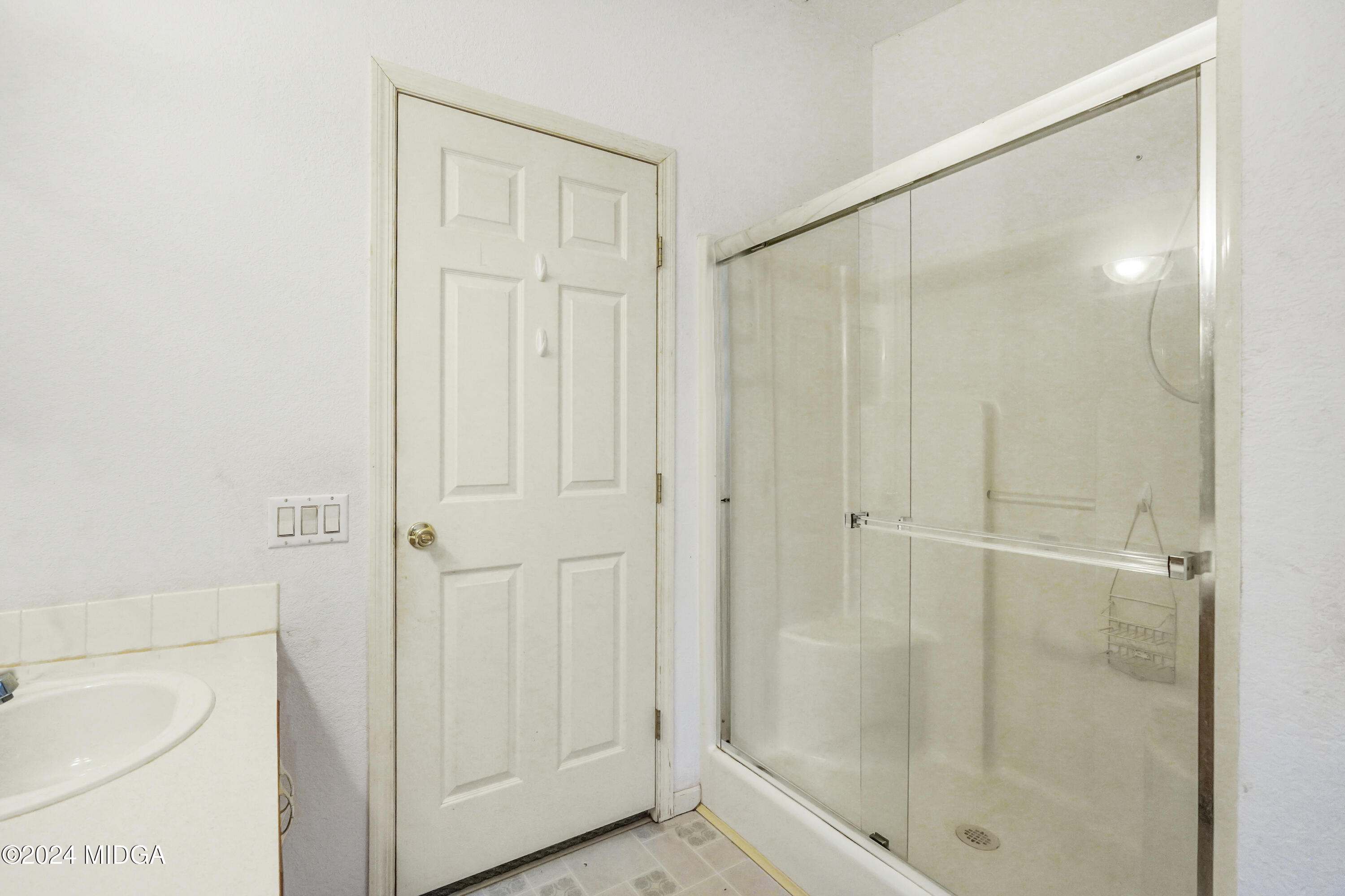 615 Fuller Road Culloden, GA 31016 - Photo 22 of 37 a bathroom with a shower and a sink