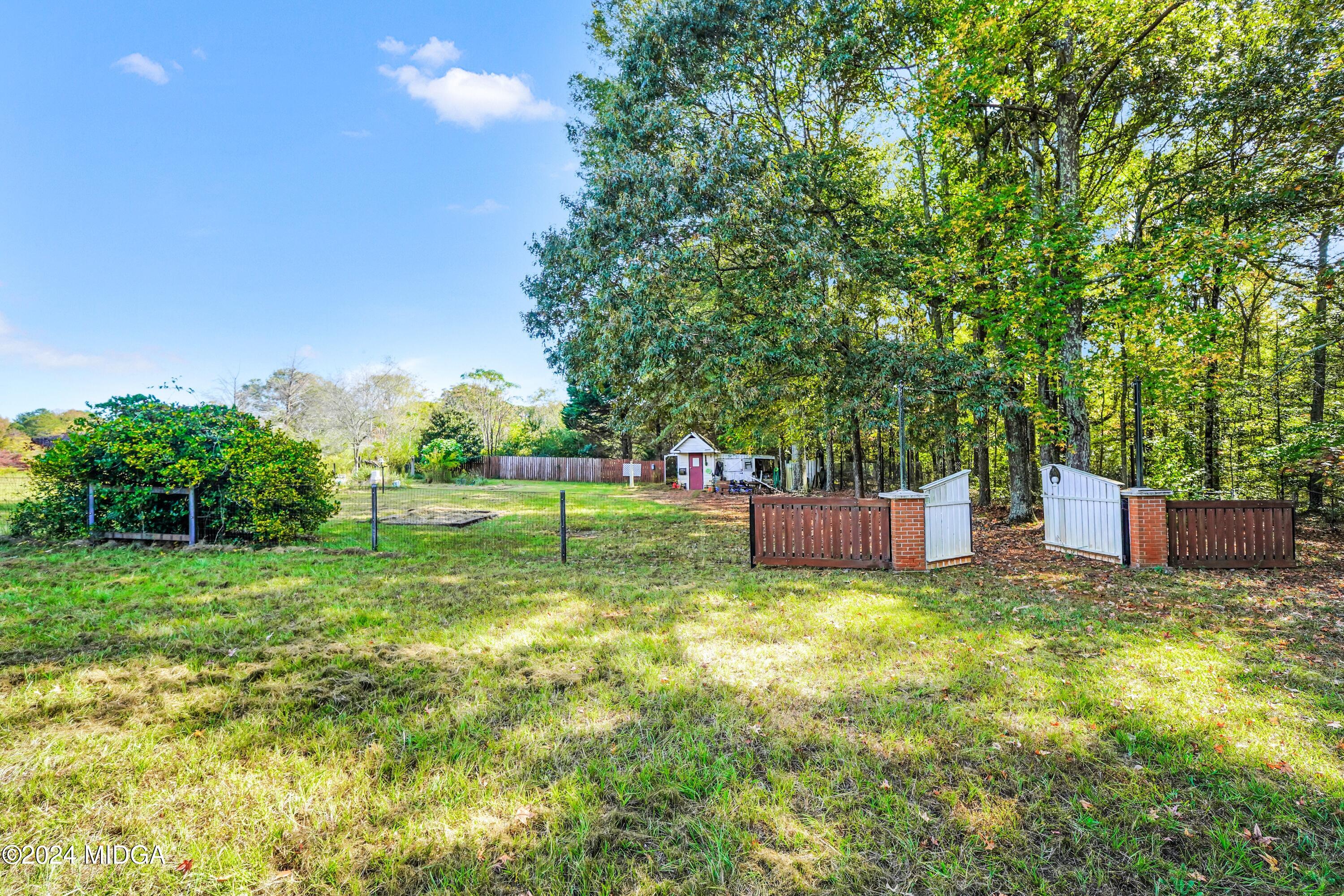 615 Fuller Road Culloden, GA 31016 - Photo 26 of 37 a view of a park with large trees