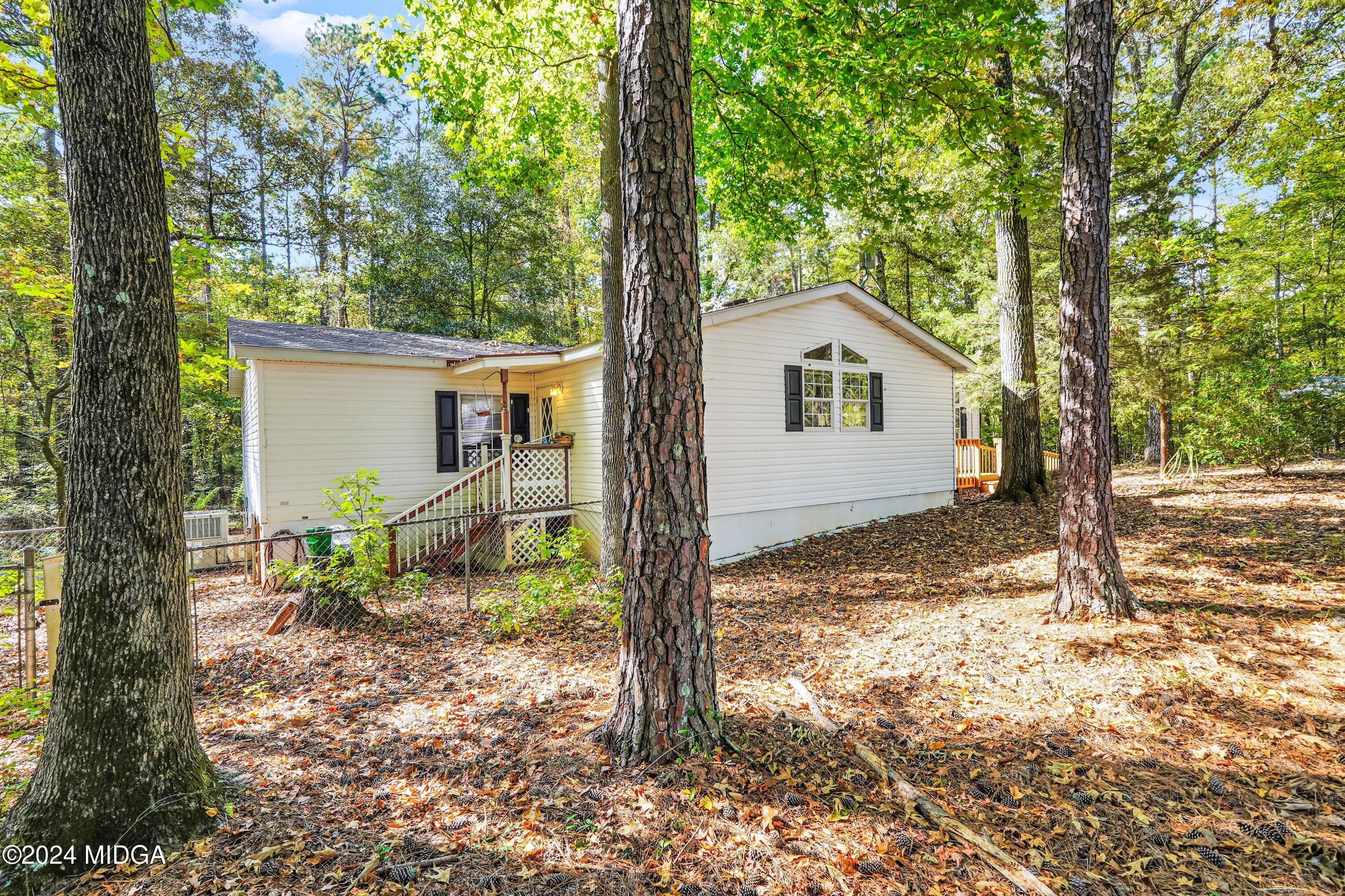 615 Fuller Road Culloden, GA 31016 - Photo 28 of 37 a house view with a backyard space