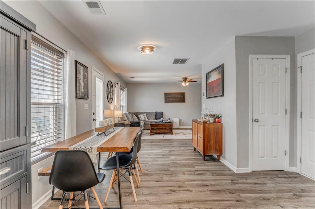 803 Riverside Drive Calhoun, GA 30701 - Photo 14 of 63 a living room with furniture and a wooden floor