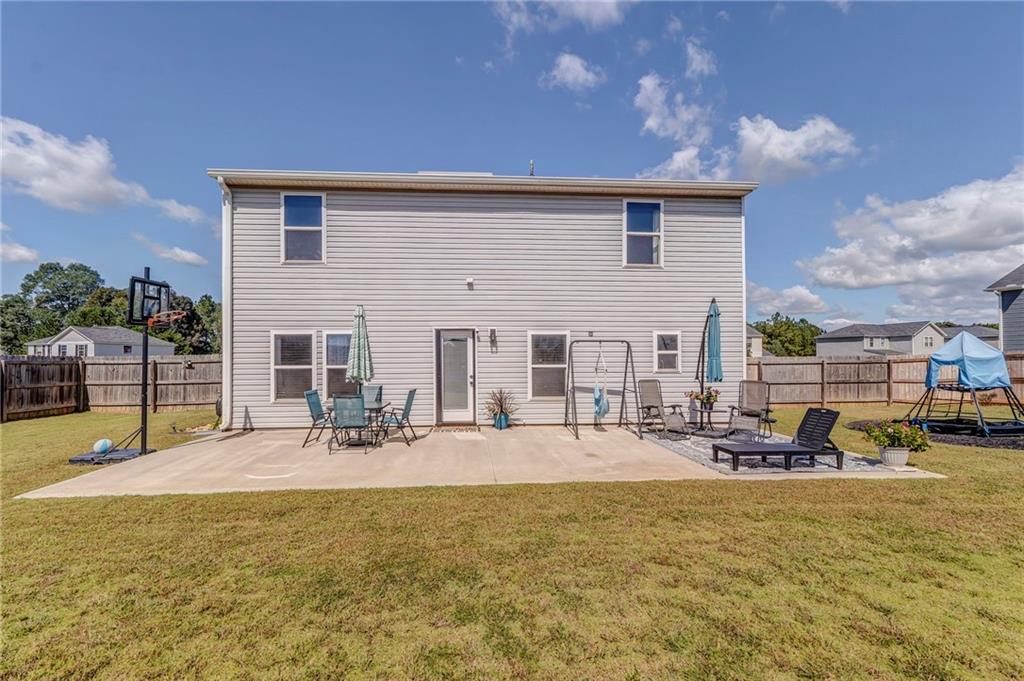 803 Riverside Drive Calhoun, GA 30701 - Photo 59 of 63 a front view of house with yard and seating
