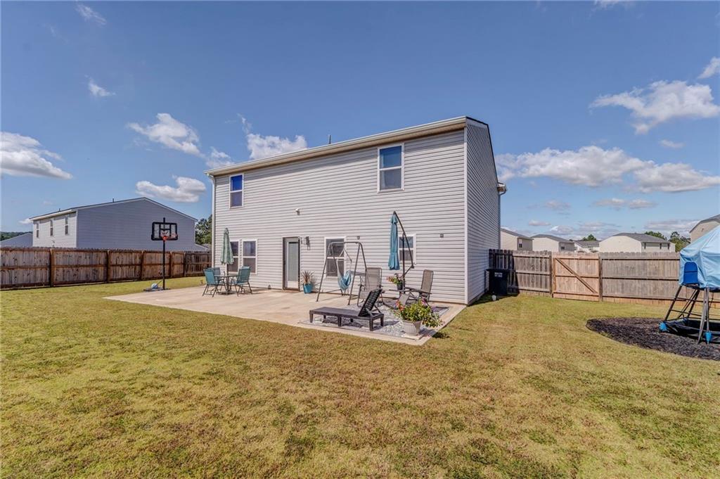 803 Riverside Drive Calhoun, GA 30701 - Photo 60 of 63 a view of a house with backyard patio and swimming pool