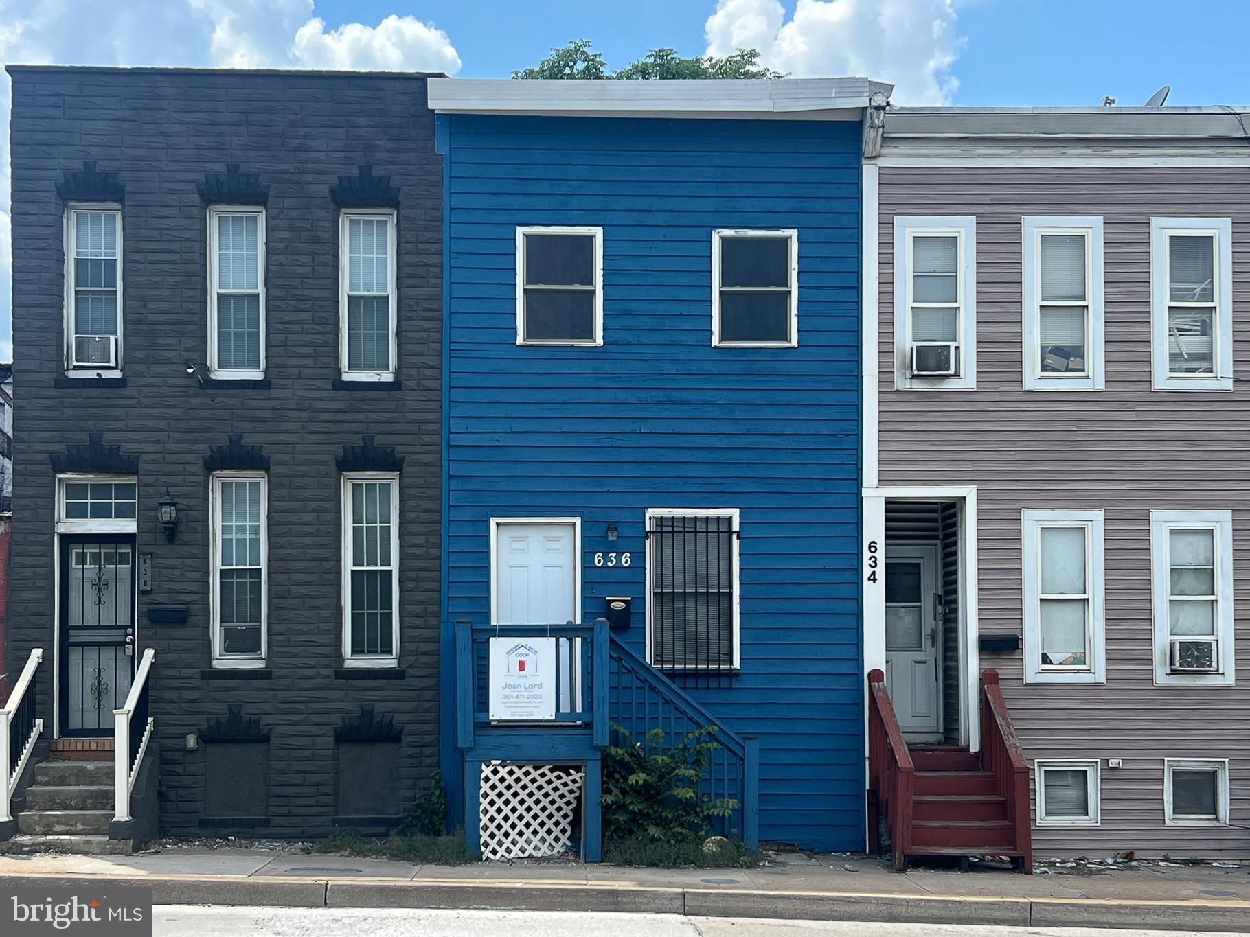 636 South Monroe Street Baltimore, MD 21223 - Photo 1 of 39 a front view of a house