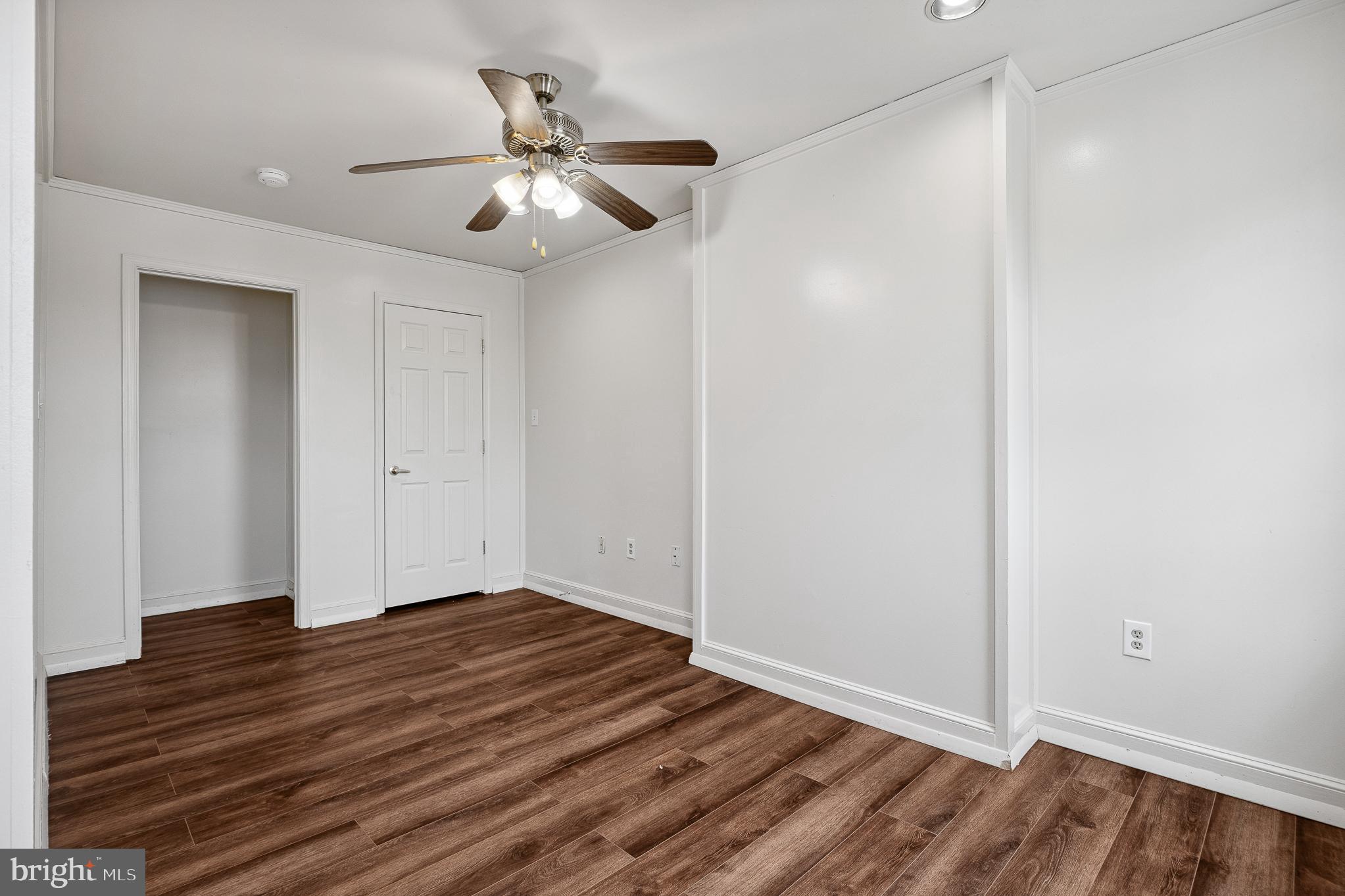 636 South Monroe Street Baltimore, MD 21223 - Photo 22 of 39 a view of a room with wooden floor