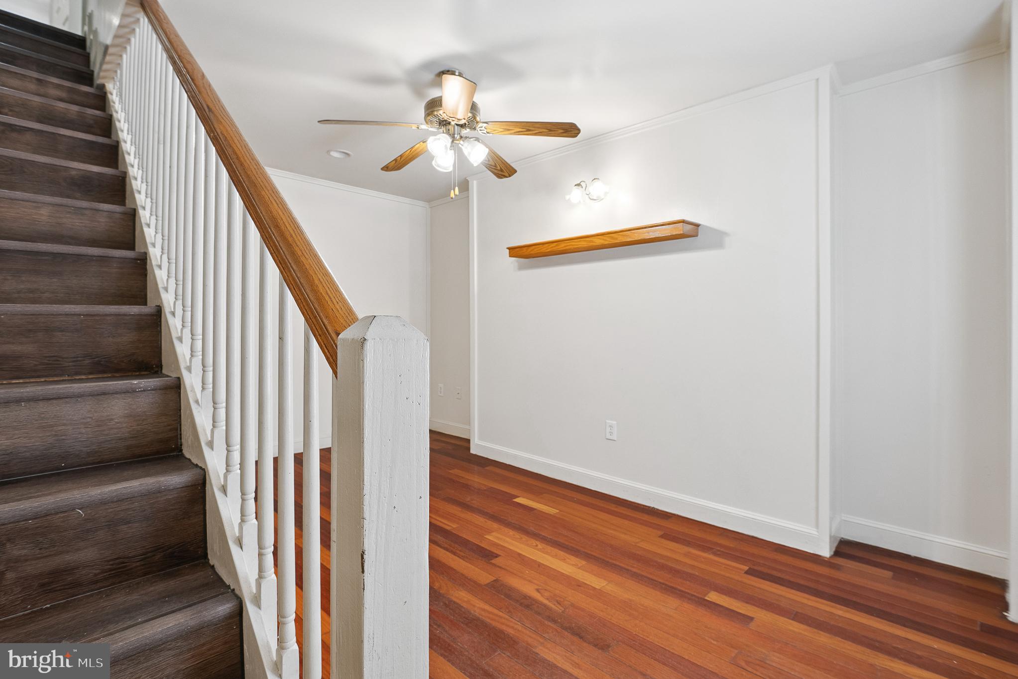 636 South Monroe Street Baltimore, MD 21223 - Photo 3 of 39 a view of entryway and hall with wooden floor