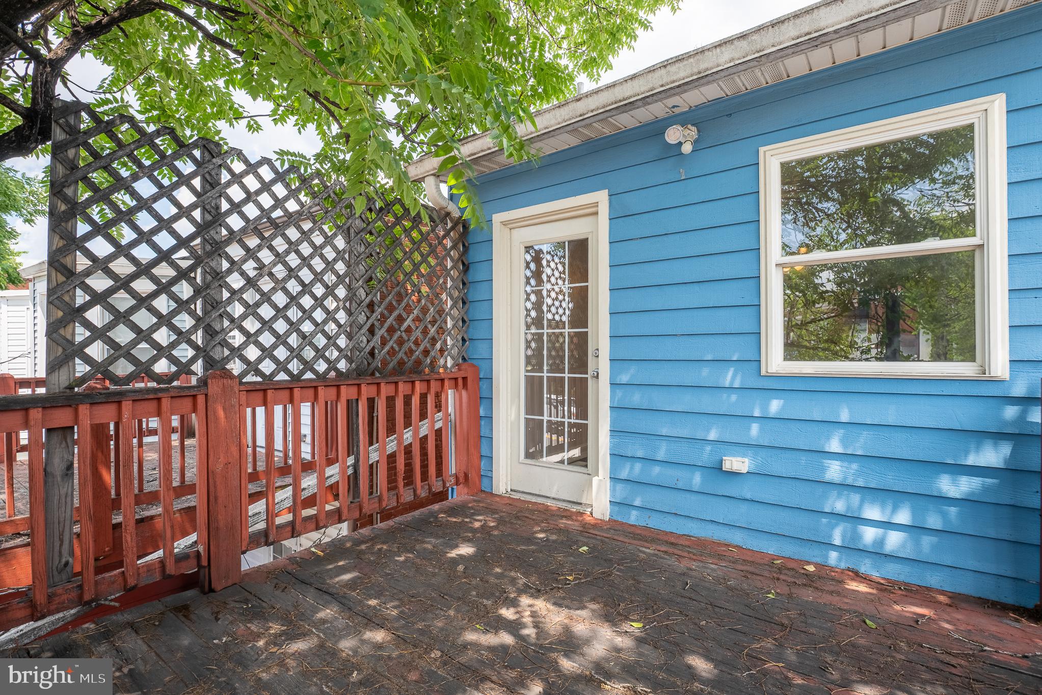 636 South Monroe Street Baltimore, MD 21223 - Photo 33 of 39 a view of backyard with wooden fence