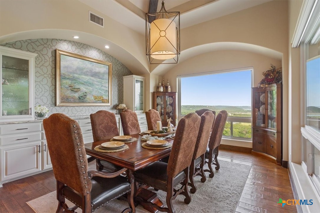 3319 Eagle Ridge Drive Harker Heights, TX 76548 - Photo 16 of 48 a view of a dining room with furniture window and wooden floor
