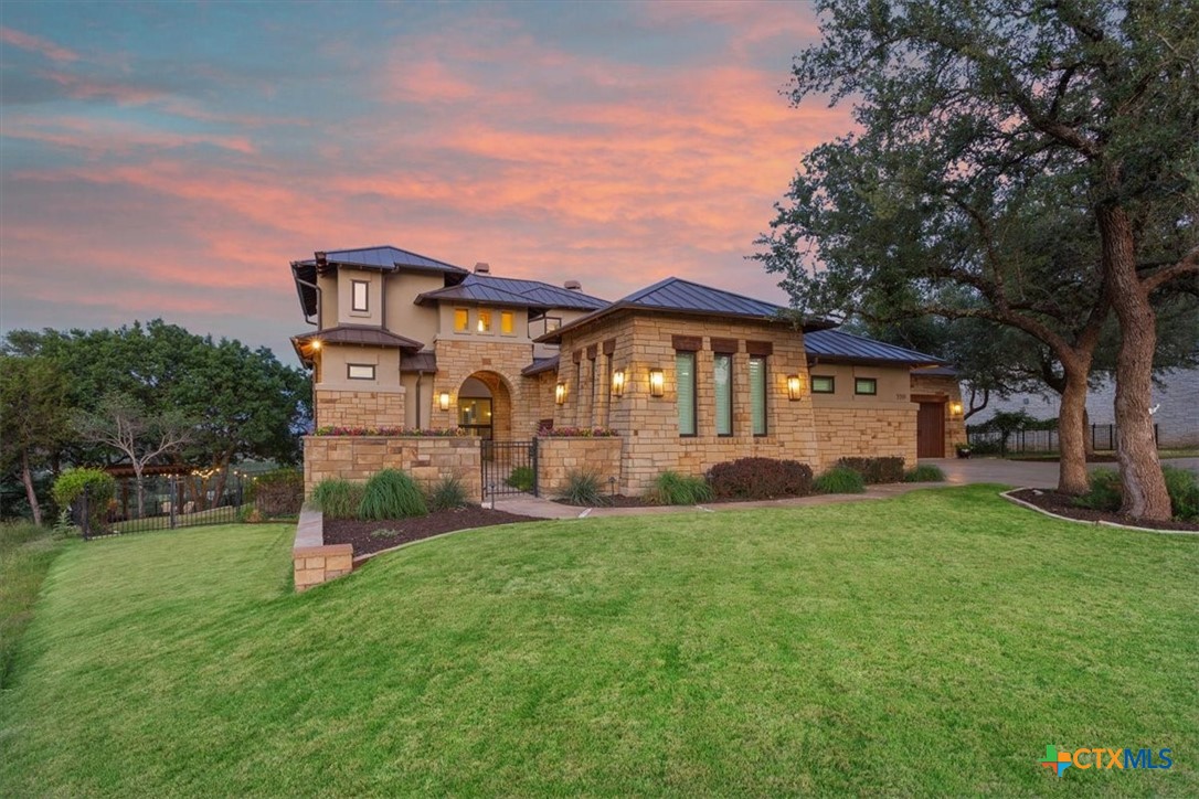 3319 Eagle Ridge Drive Harker Heights, TX 76548 - Photo 2 of 48 a front view of a house with a yard and garage