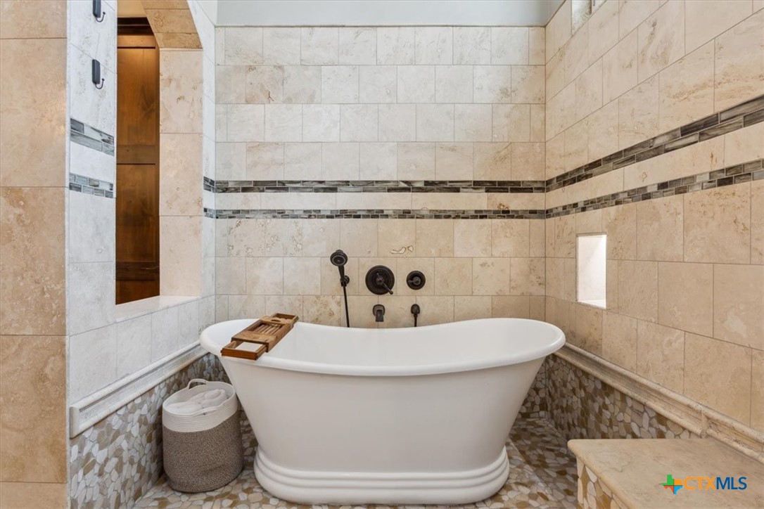 3319 Eagle Ridge Drive Harker Heights, TX 76548 - Photo 22 of 48 a white toilet sitting next to a bathroom sink