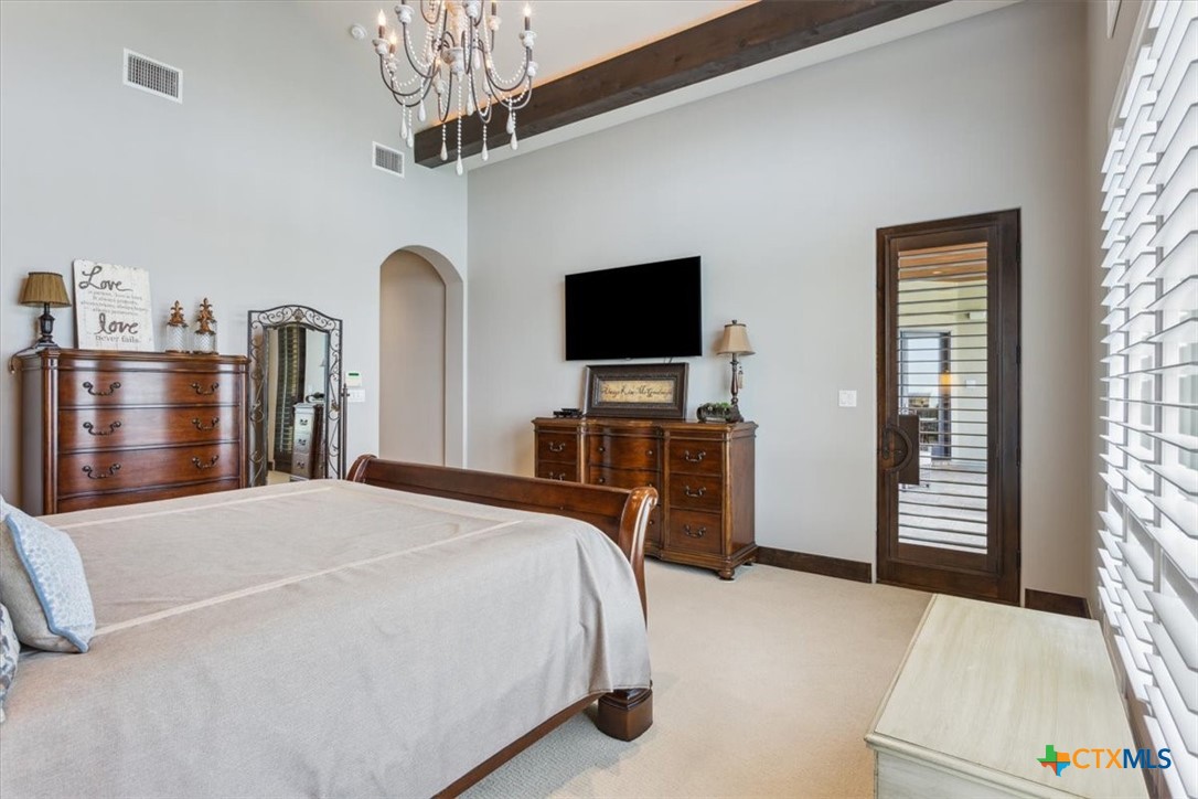 3319 Eagle Ridge Drive Harker Heights, TX 76548 - Photo 25 of 48 a bedroom with a bed and a flat screen tv