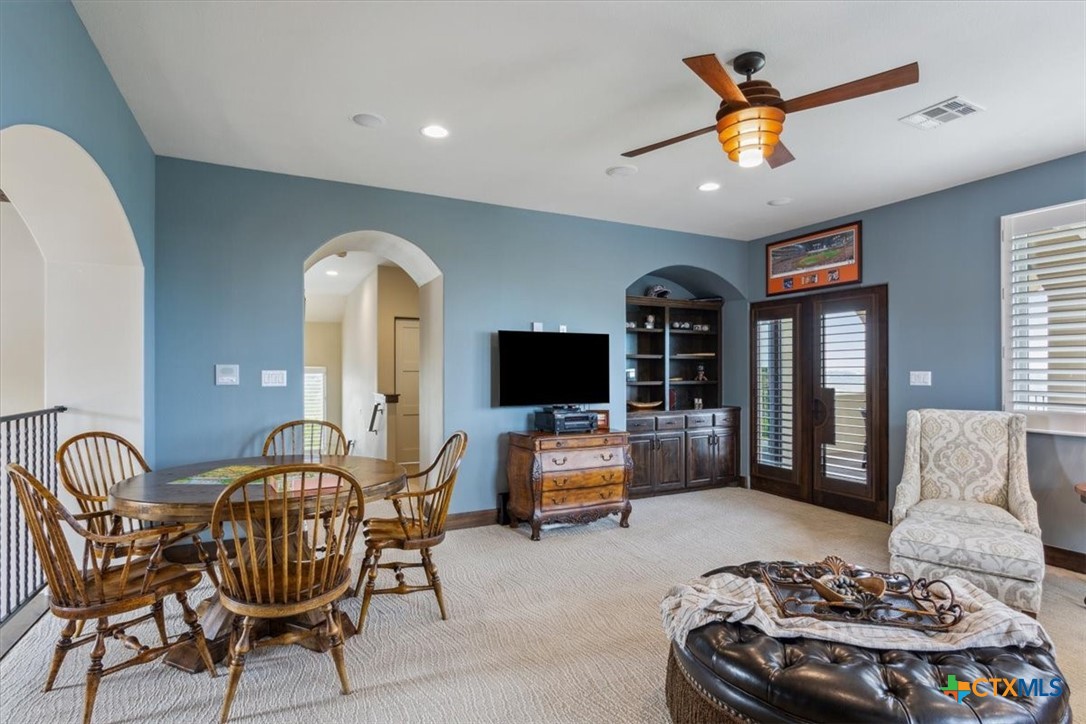 3319 Eagle Ridge Drive Harker Heights, TX 76548 - Photo 33 of 48 a living room with furniture and a flat screen tv