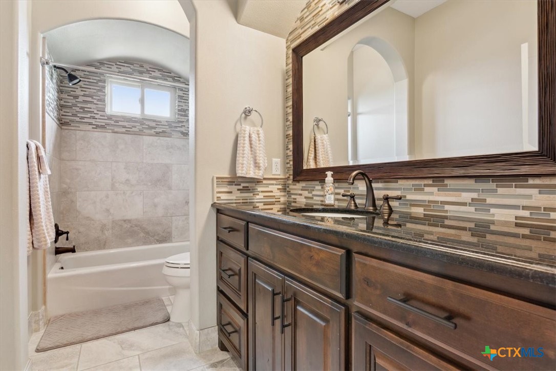 3319 Eagle Ridge Drive Harker Heights, TX 76548 - Photo 36 of 48 a bathroom with a bathtub and a sink