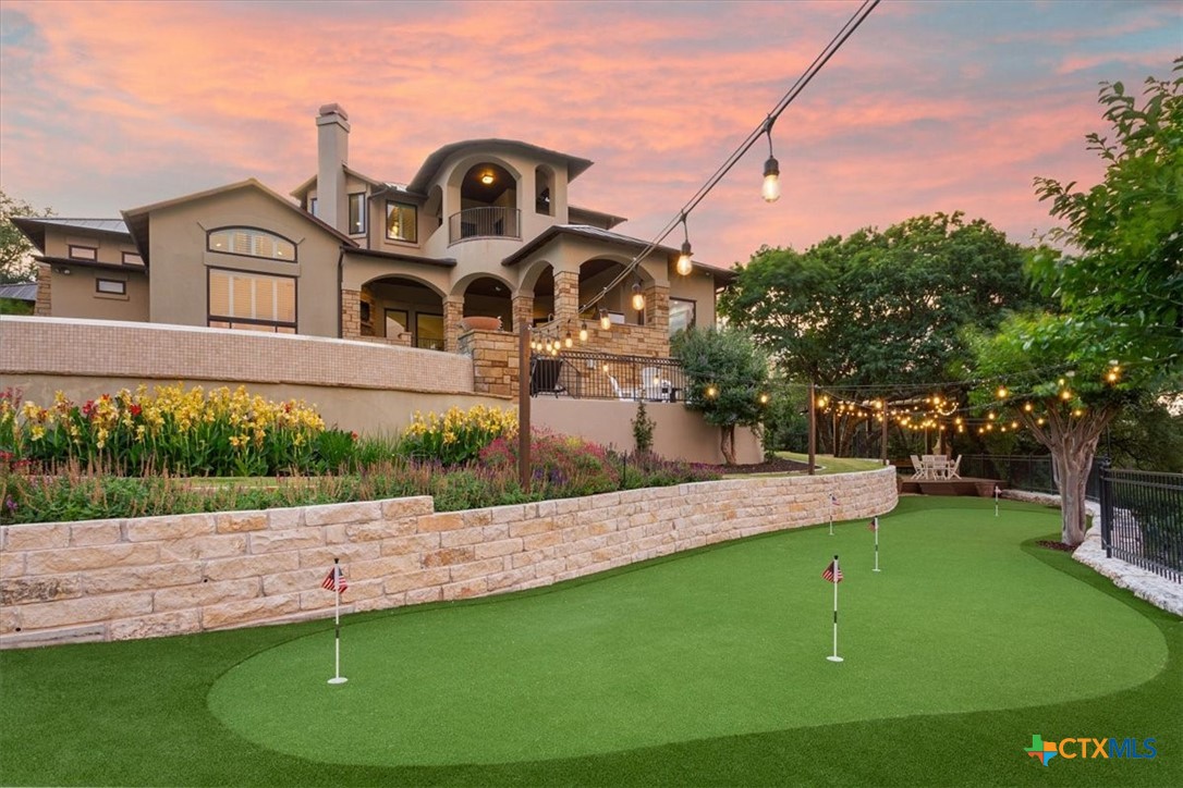 3319 Eagle Ridge Drive Harker Heights, TX 76548 - Photo 4 of 48 a front view of a house with a garden and yard
