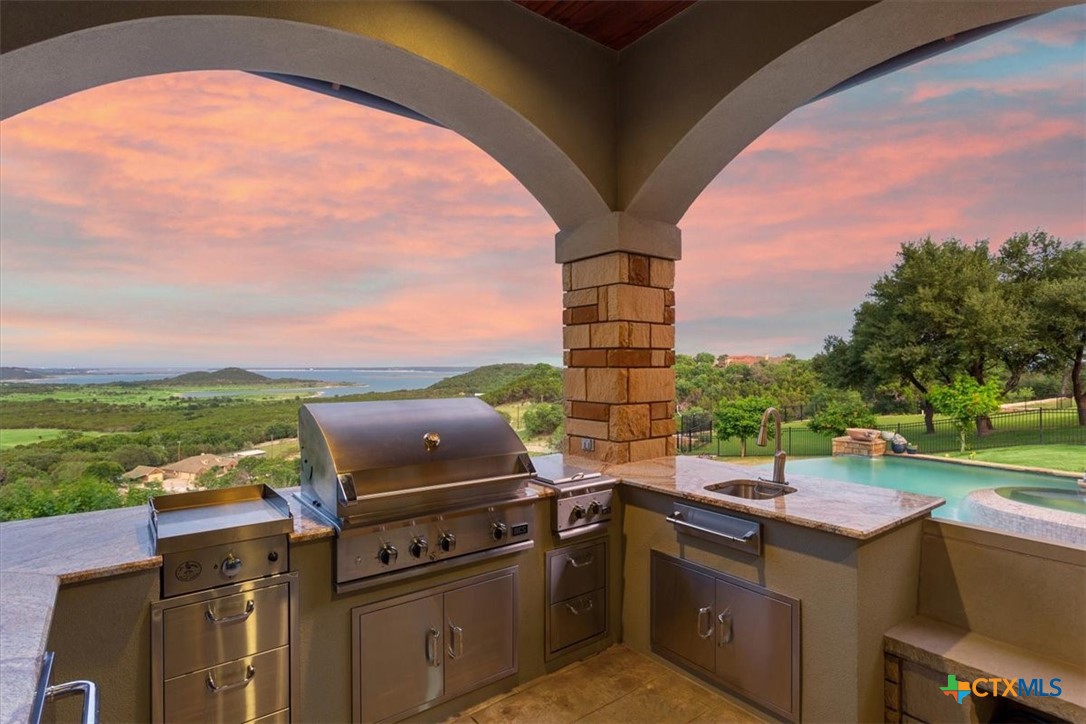 3319 Eagle Ridge Drive Harker Heights, TX 76548 - Photo 42 of 48 a view of a backyard with sitting area