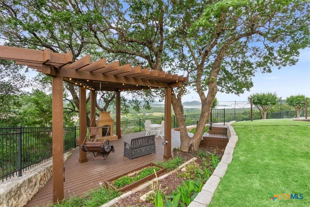 3319 Eagle Ridge Drive Harker Heights, TX 76548 - Photo 45 of 48 a view of a chair and table in backyard of the house
