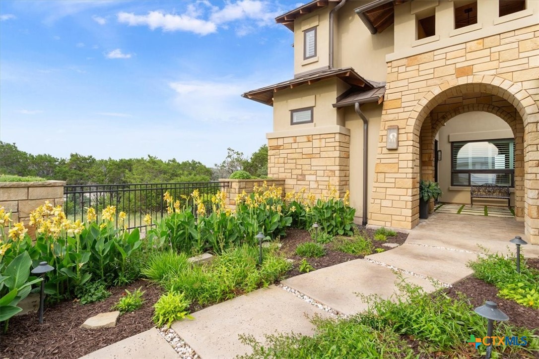 3319 Eagle Ridge Drive Harker Heights, TX 76548 - Photo 7 of 48 a front view of a house with garden and patio