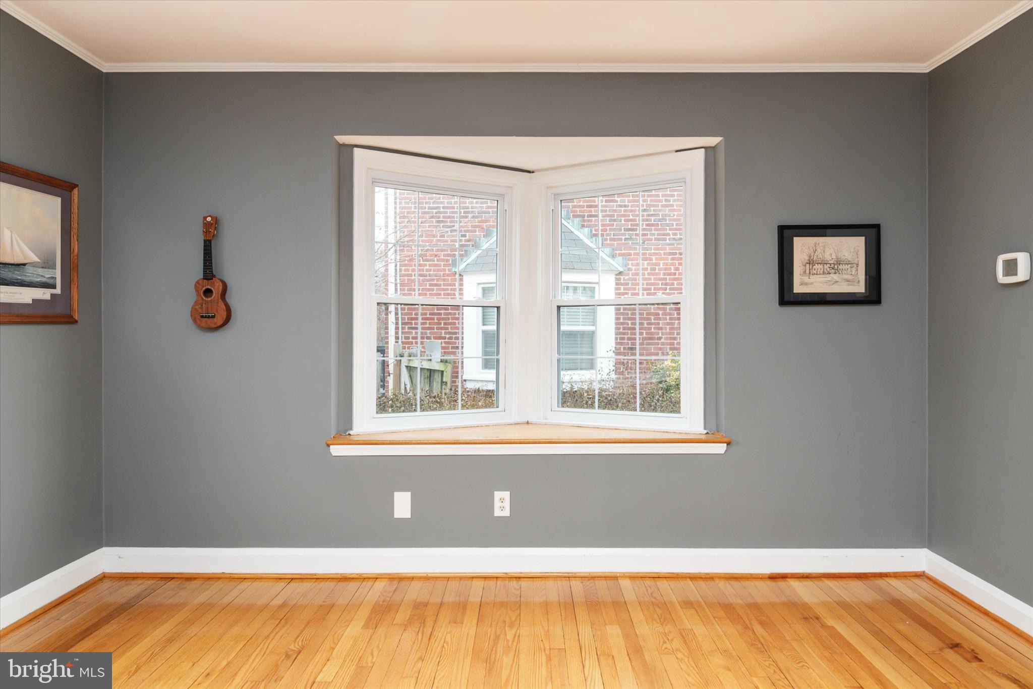 8122 Glen Gary Road Towson, MD 21286 - Photo 12 of 48 a view of a room with wooden floor and a window