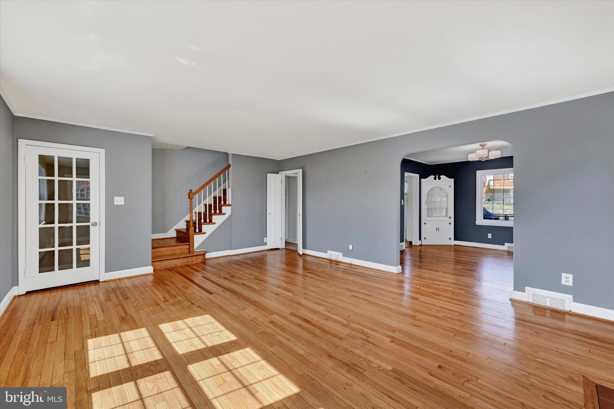 8122 Glen Gary Road Towson, MD 21286 - Photo 19 of 48 a view of empty room with wooden floor and fan