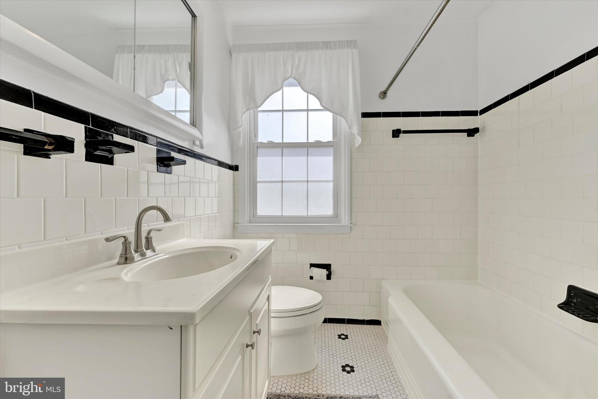 8122 Glen Gary Road Towson, MD 21286 - Photo 20 of 48 a bathroom with a sink and a bathtub