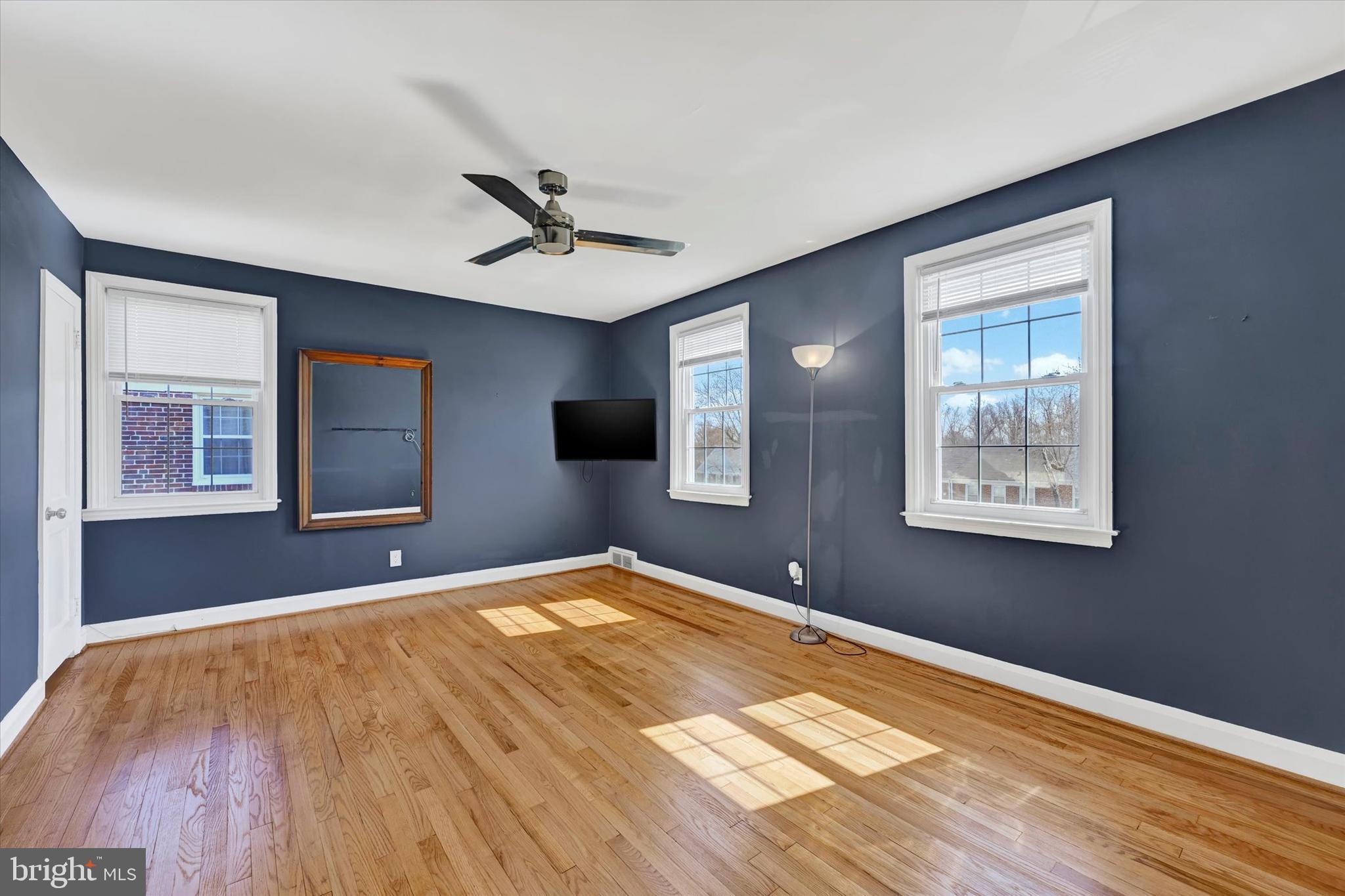8122 Glen Gary Road Towson, MD 21286 - Photo 22 of 48 a bedroom with a large bed and a window