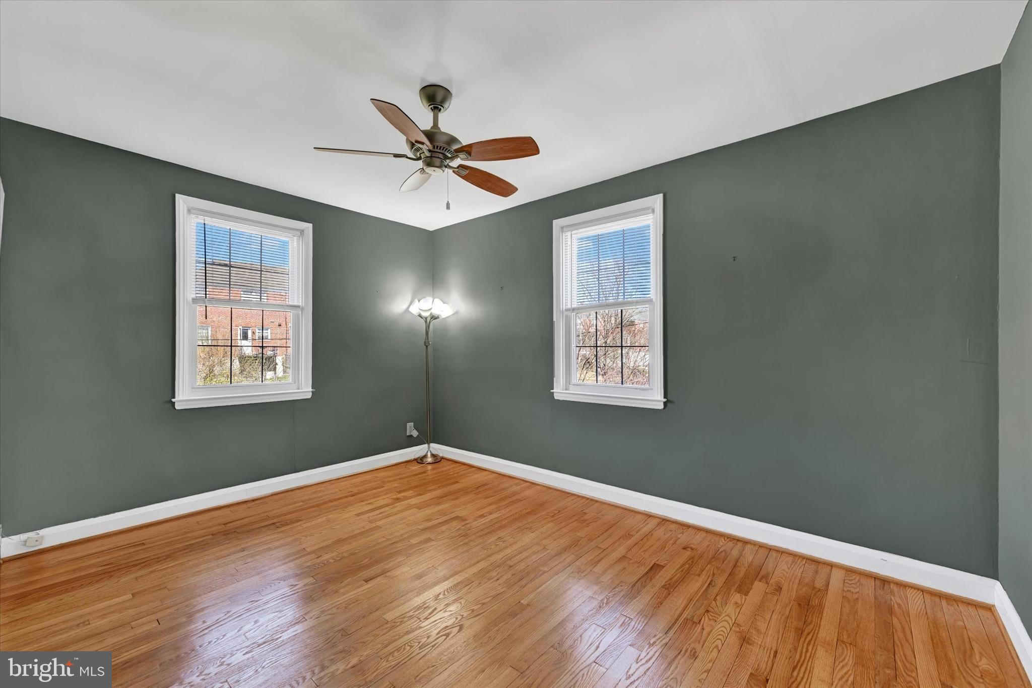 8122 Glen Gary Road Towson, MD 21286 - Photo 24 of 48 a view of a big room with wooden floor closet and windows