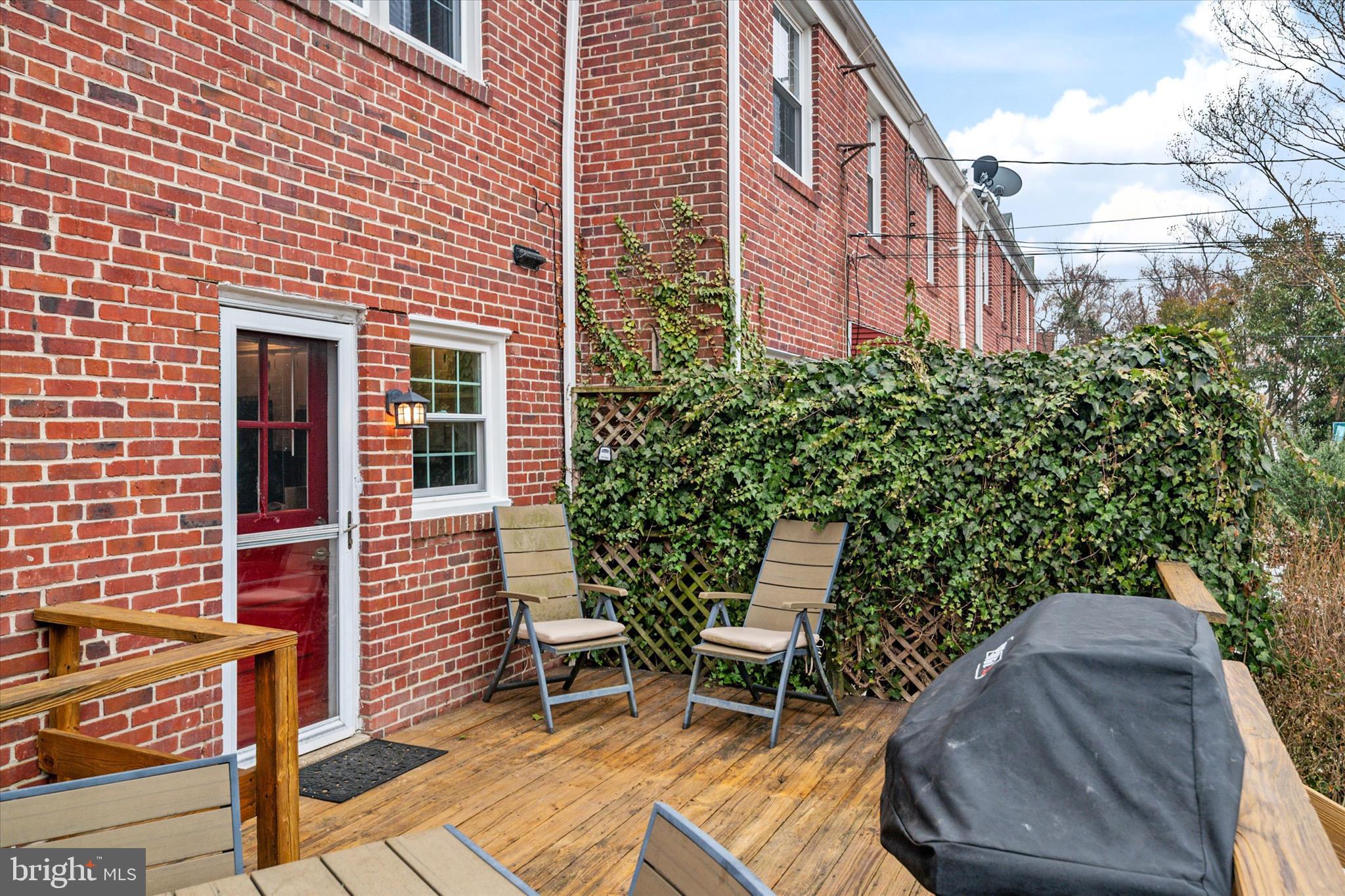 8122 Glen Gary Road Towson, MD 21286 - Photo 36 of 48 a view of a chairs and table in backyard of the house