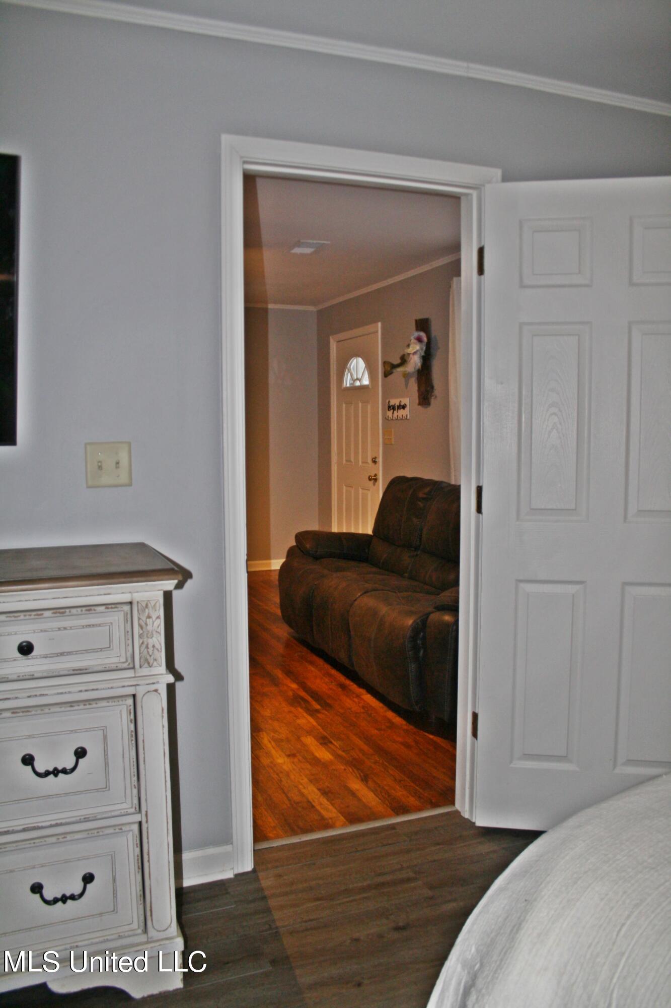 1334 Brownlee Road Sarah, MS 38665 - Photo 16 of 24 masterbedroom into living