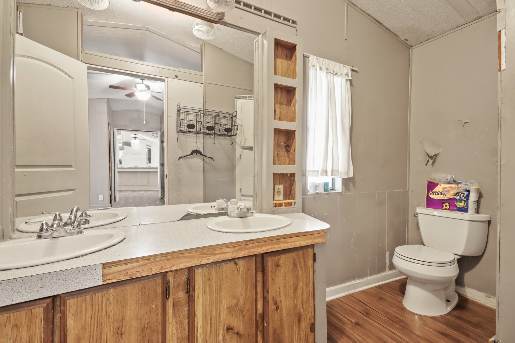 17317 East Greenleaf Lane Conroe, TX 77306 - Photo 12 of 24 a bathroom with a sink and a mirror