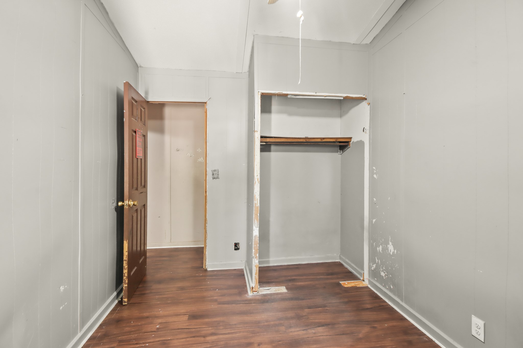 17317 East Greenleaf Lane Conroe, TX 77306 - Photo 18 of 24 a view of a hallway with wooden floor