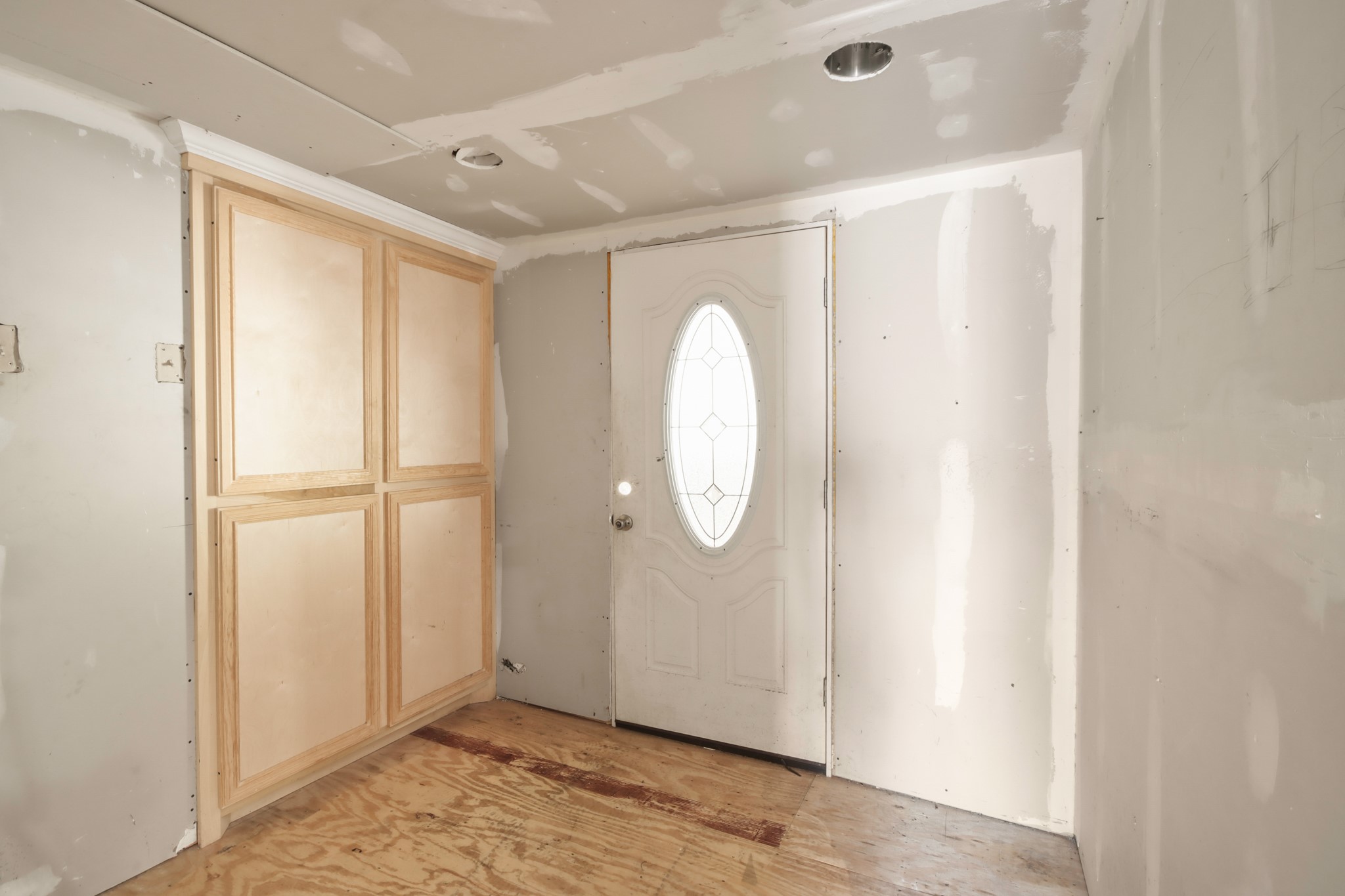 17317 East Greenleaf Lane Conroe, TX 77306 - Photo 19 of 24 a view of a room with wooden floor and white walls