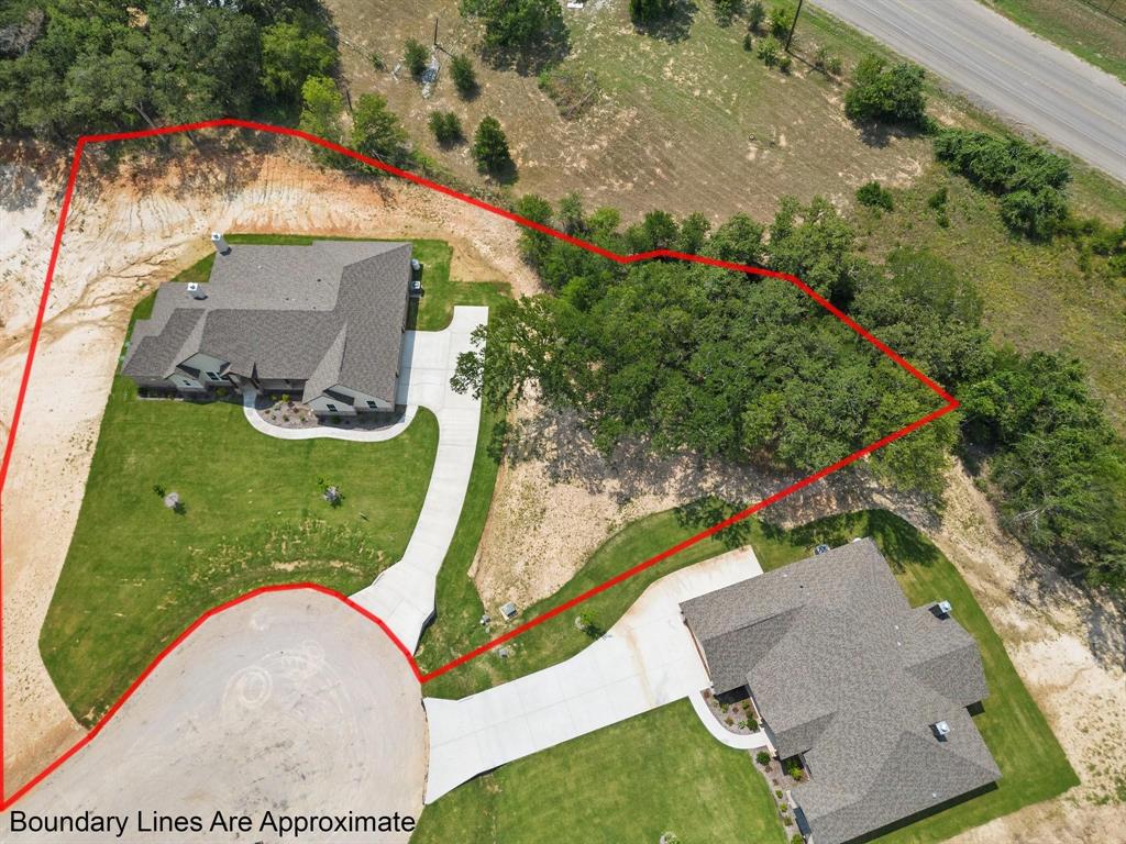 715 Winkler Way Springtown, TX 76082 - Photo 1 of 1 property lines, grass is now grown in more, brush has been cleaned and cleared and privacy fence added to back side of property