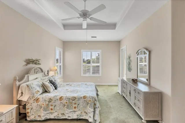 a view of a large building with a tree in the background