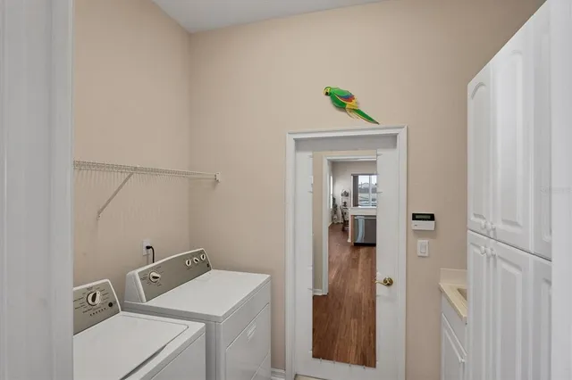 an aerial view of a house with a ocean view