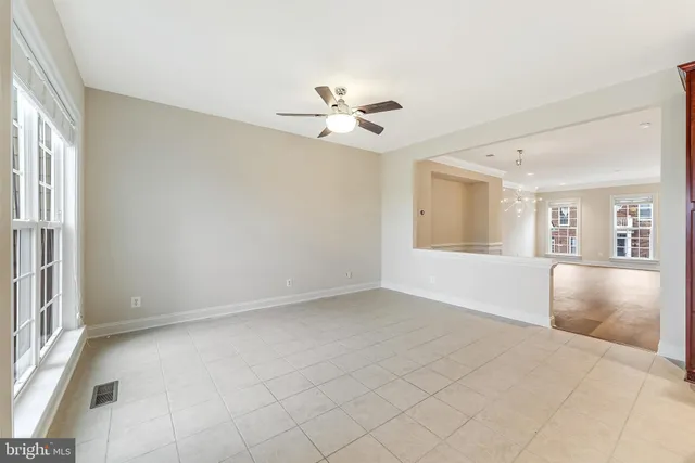 a view of a kitchen with microwave and a stove top oven