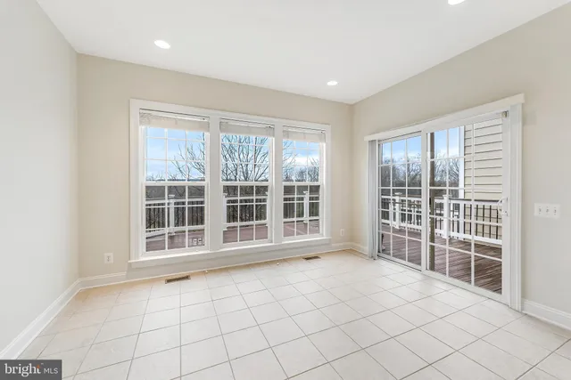 a view of a house with a large window
