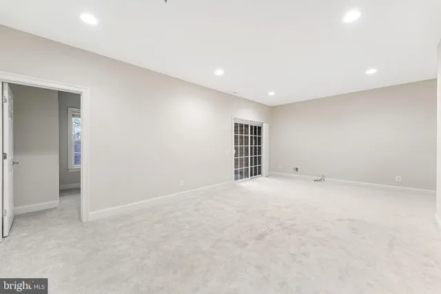 a view of swimming pool with outdoor seating and garden