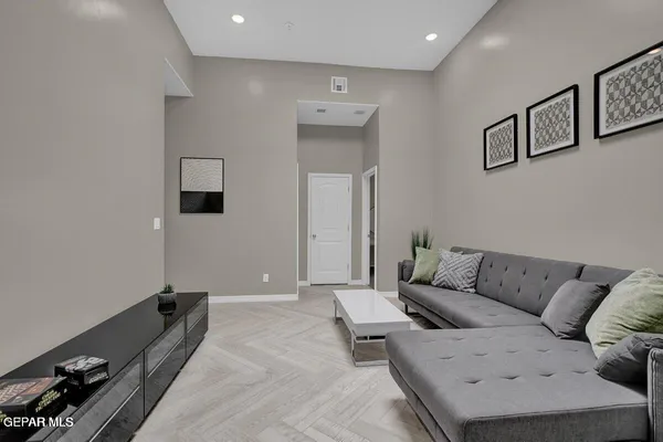 a living room with furniture and a couch